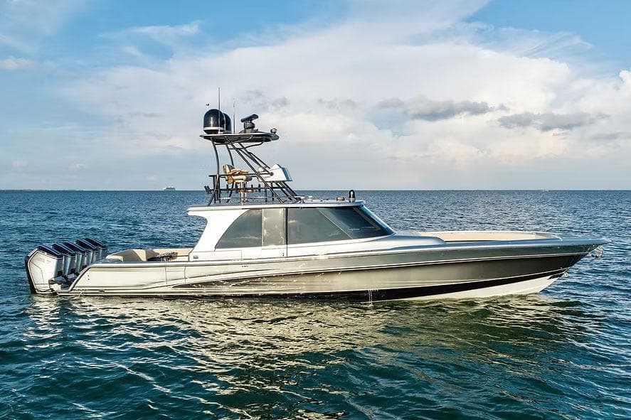 Manufacturer Provided Image: 2026 Ocean Yachts 52 CC cruising on open water under a clear sky.
