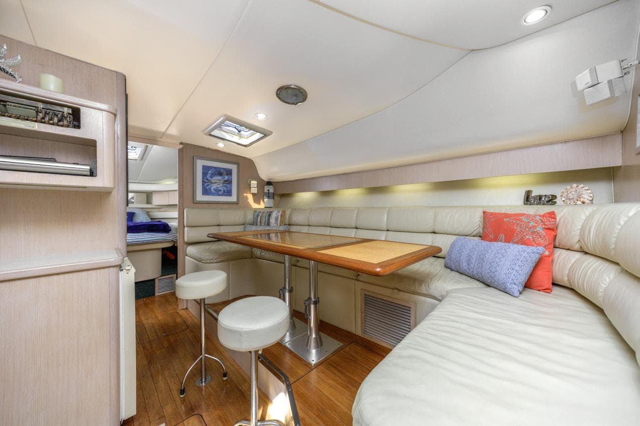 Luxurious interior of 2000 Tiara Yachts 4000 Express with plush seating and elegant decor.