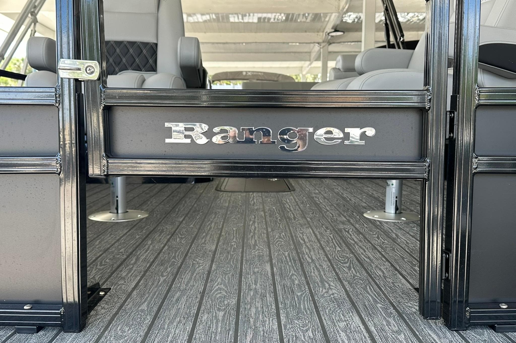 2026 Ranger Reata 223FC boat interior with sleek seating and stylish flooring.