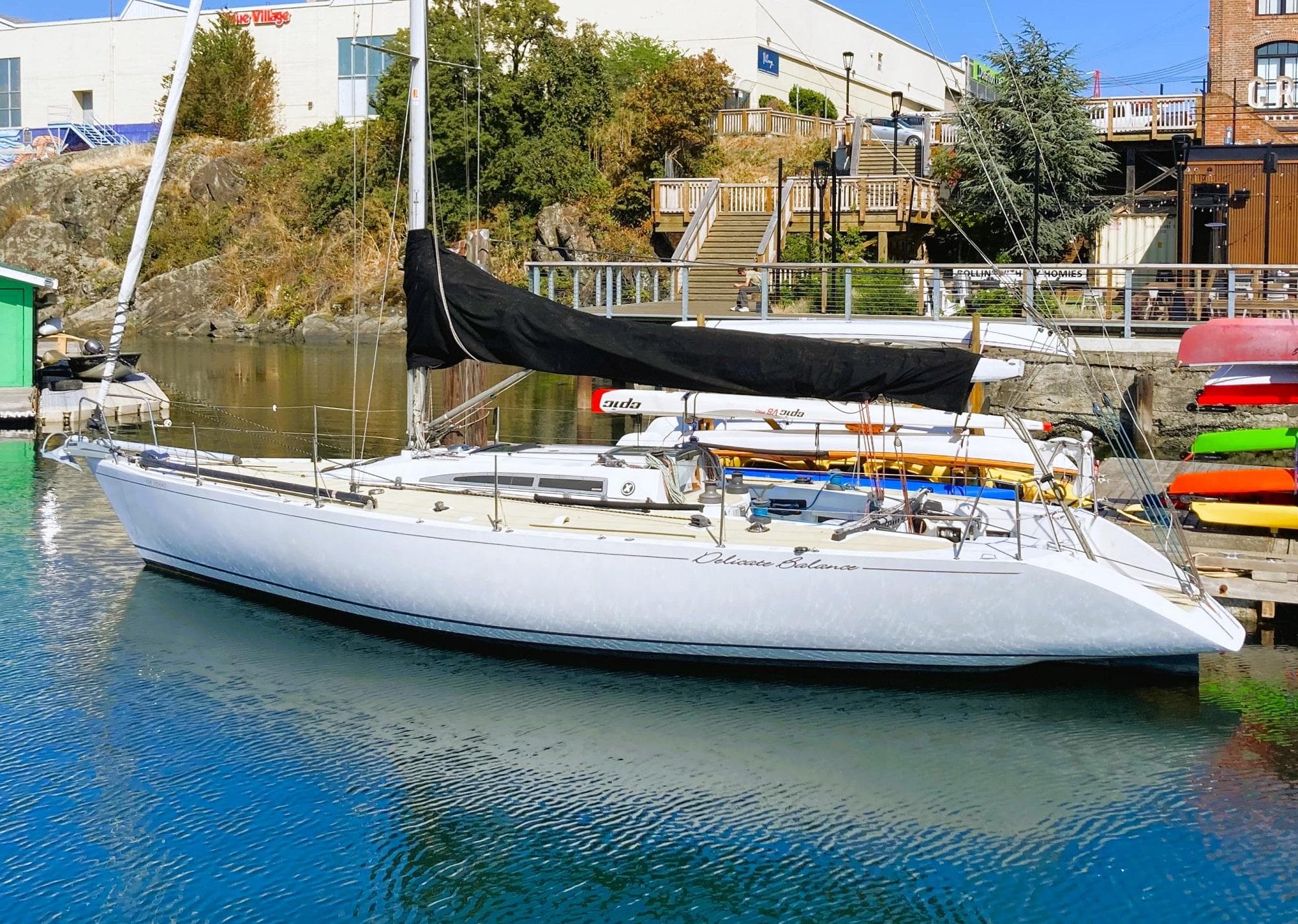 1985 X-Yachts X-One Ton Mk1 sailboat docked in a marina.