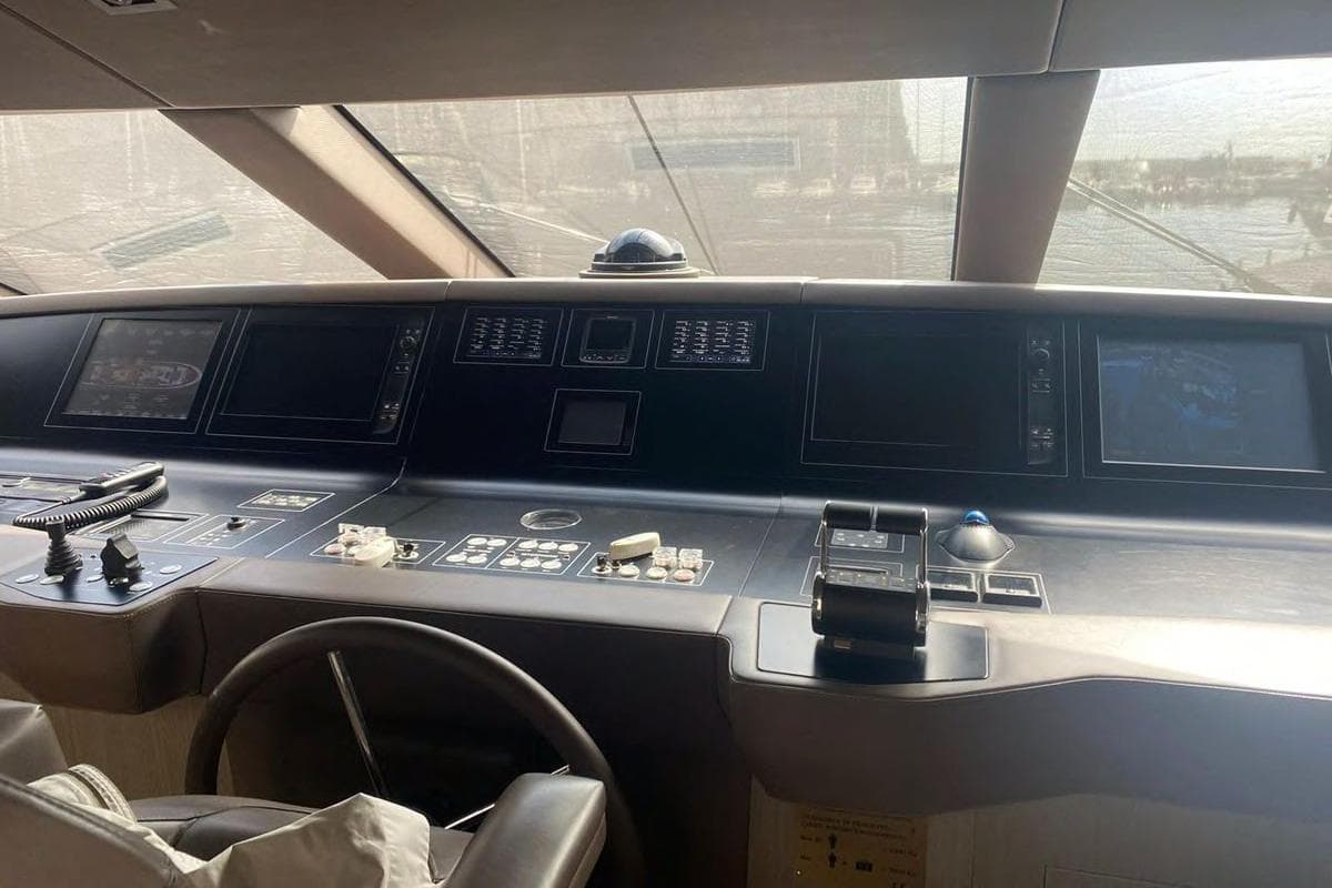 Helm station of 2016 Sanlorenzo SL96 yacht with advanced navigation systems.