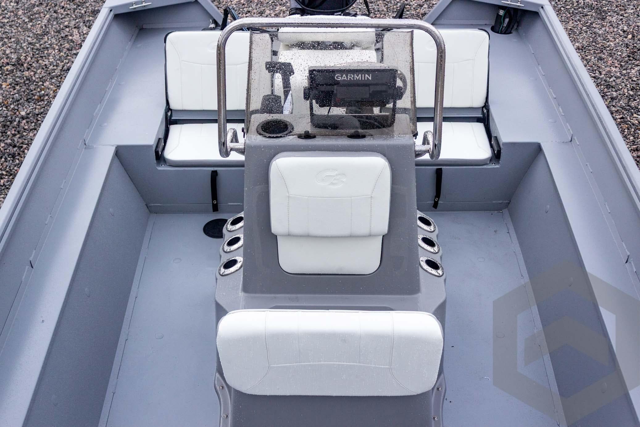 2026 G3 Bay 20 boat interior with white seating and Garmin navigation system.