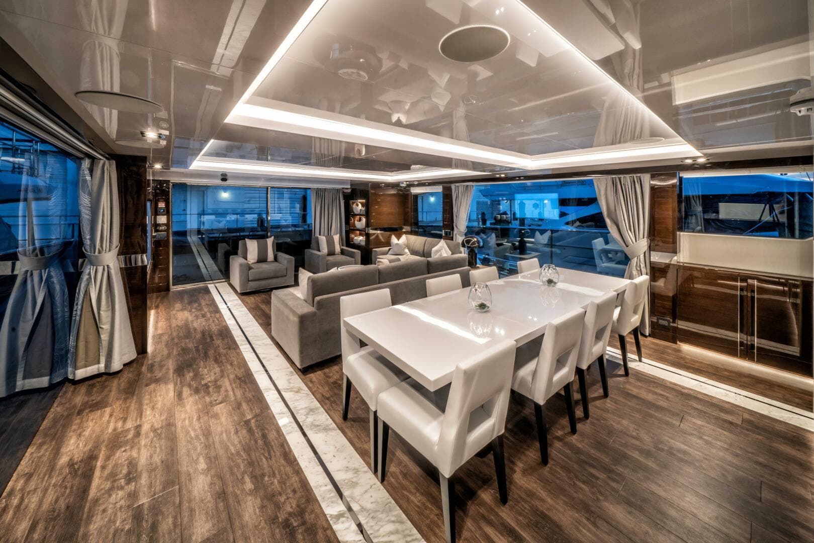 Luxurious interior of 2020 Pearl 95 yacht with elegant dining and living area.