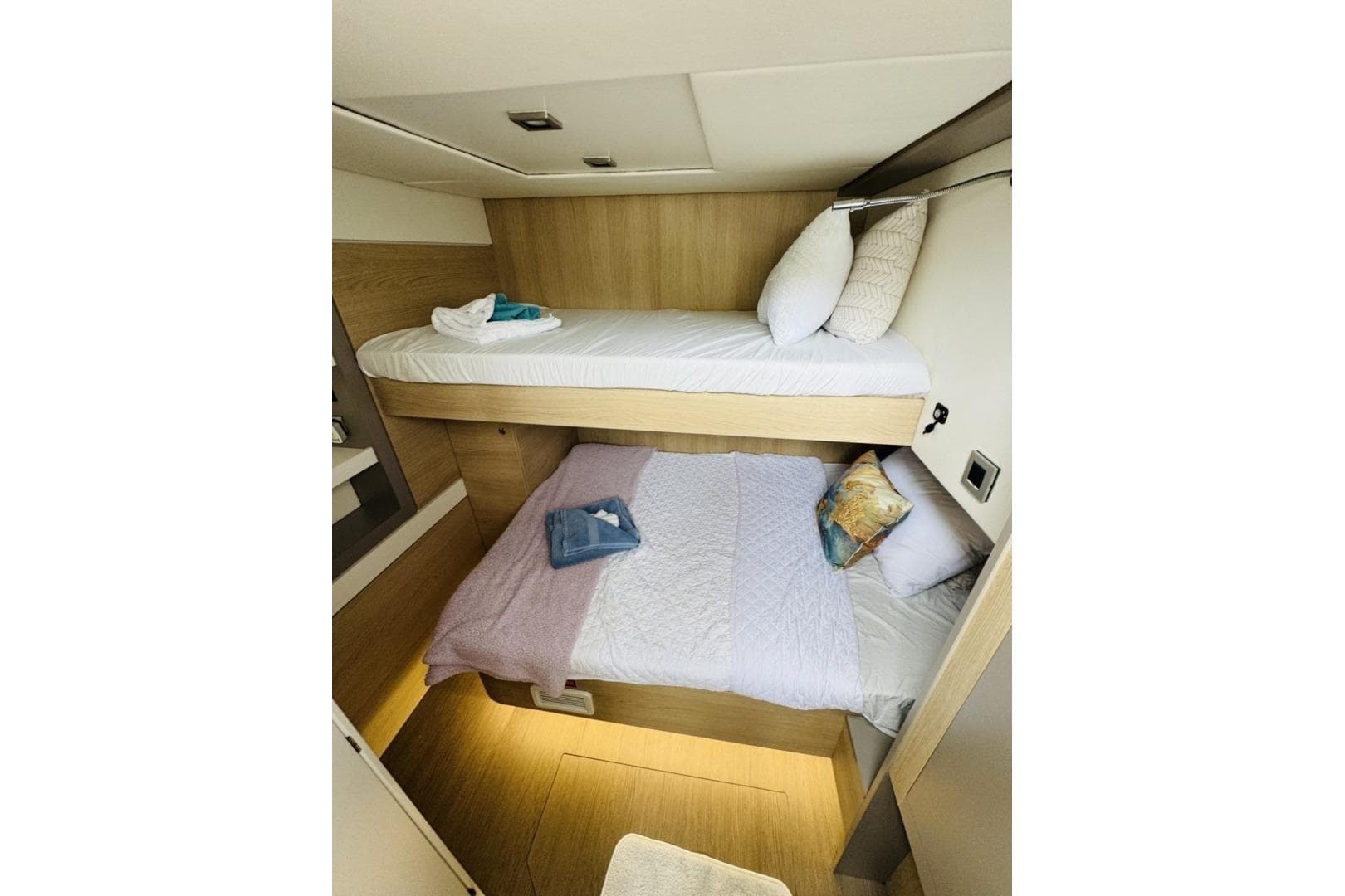 Bali 5.4 yacht interior with cozy bunk beds, 2019 model.