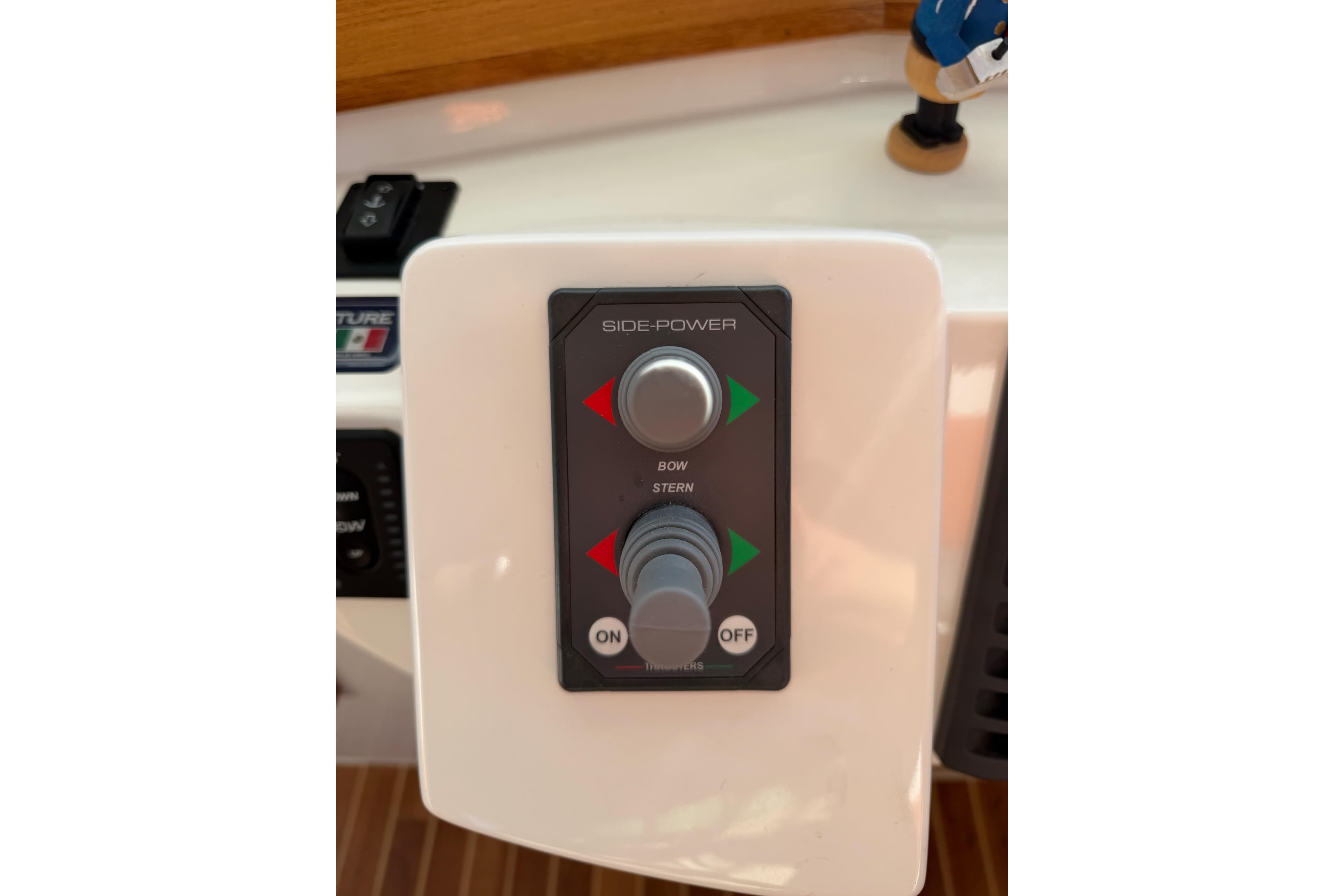 Control panel of a 2017 Aspen C120 boat with side-power joystick.
