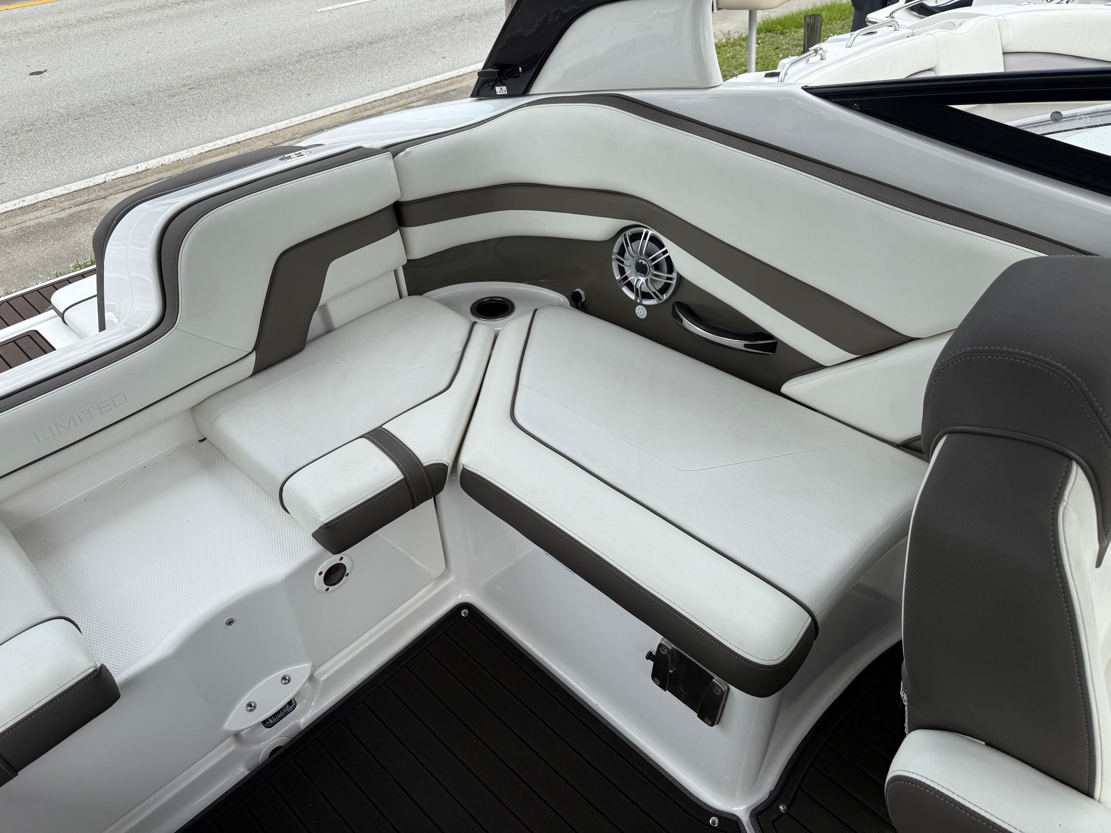 2016 Yamaha Boats 242 Limited S E-Series interior with sleek white and gray seating.