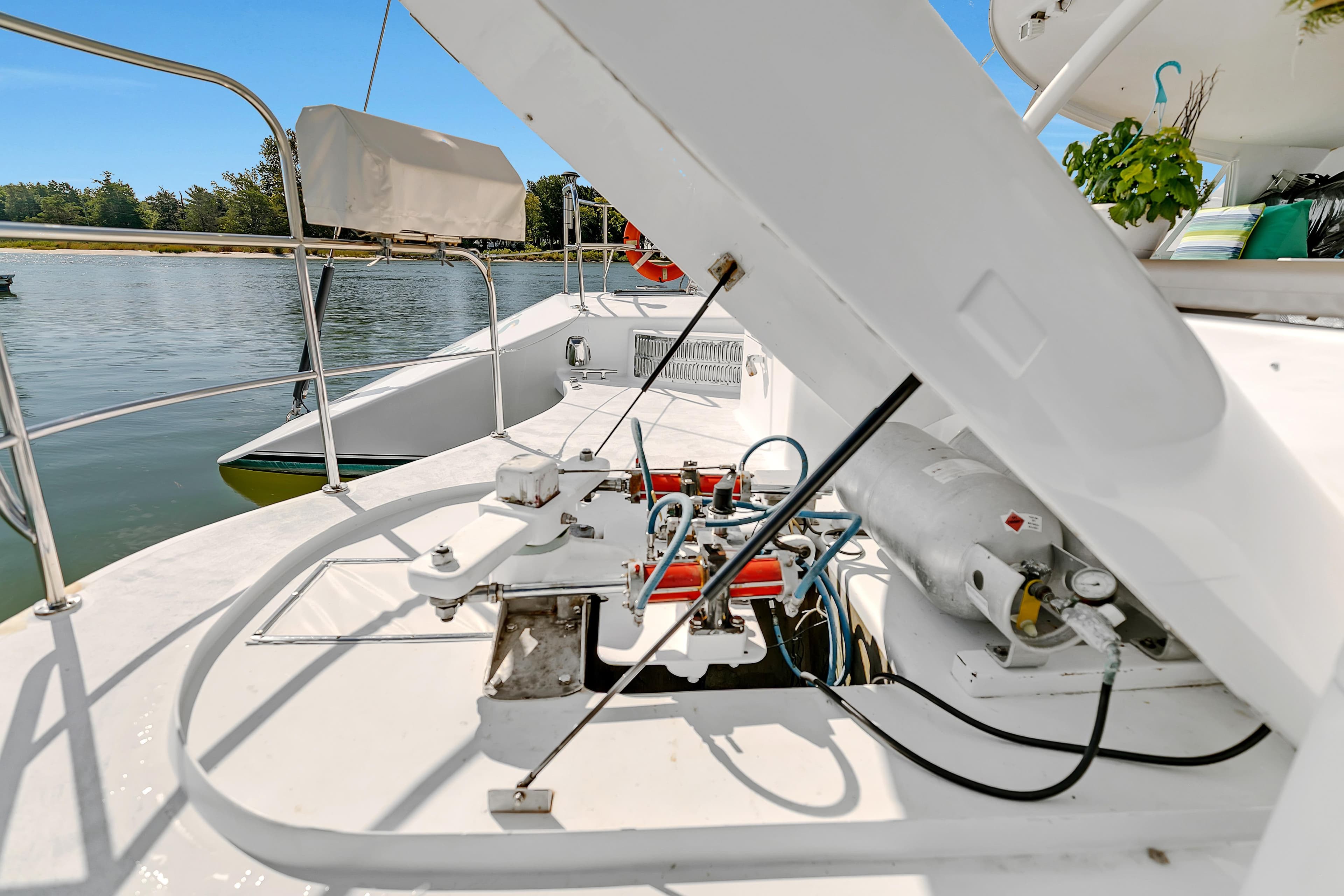 1988 Kelsall Manannan Custom yacht deck with open hatch and visible equipment.