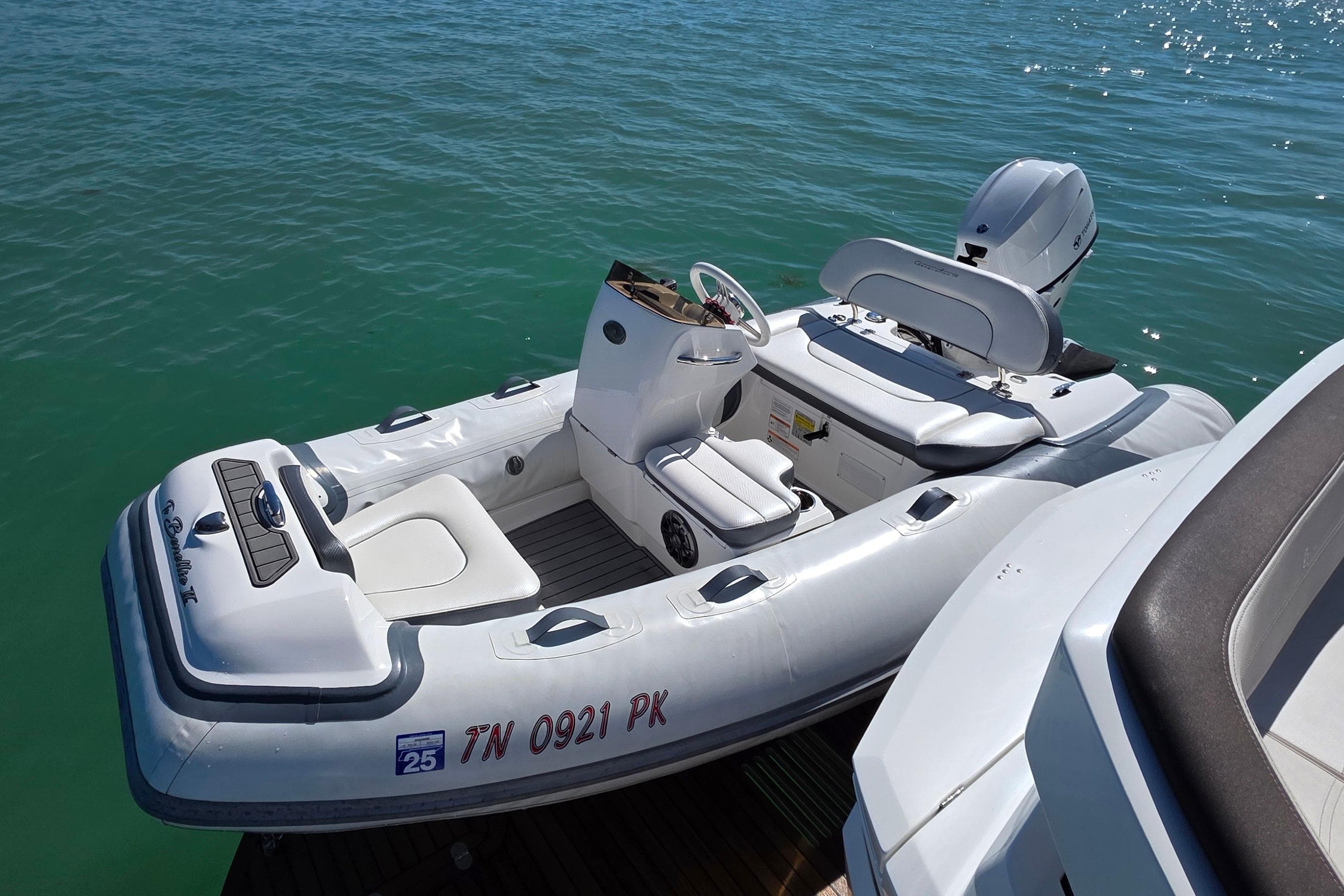 2022 Galeon 500 Fly yacht with sleek design, docked on clear blue water.