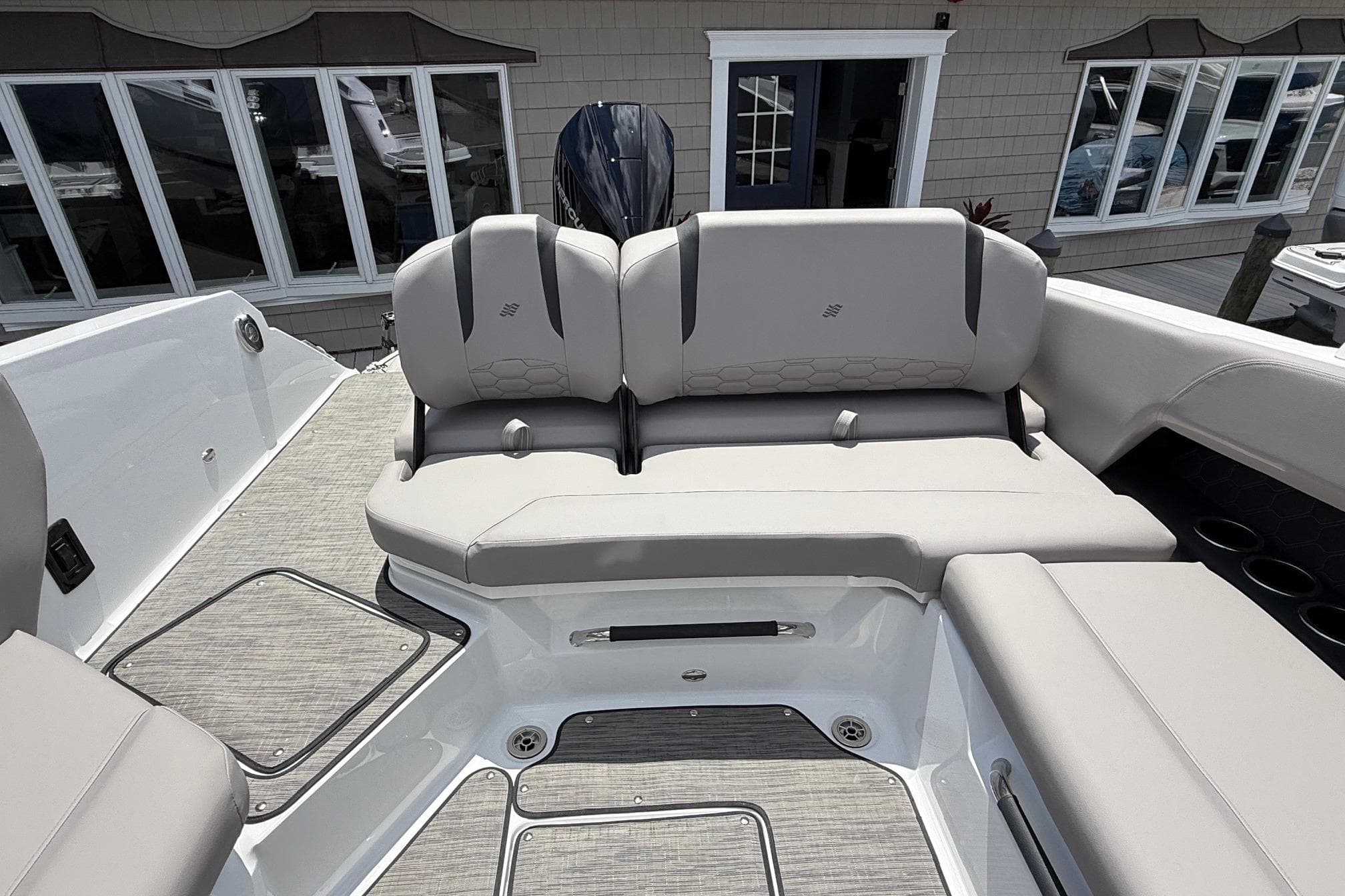 Interior of 2026 Four Winns H6 OB with luxurious seating.
