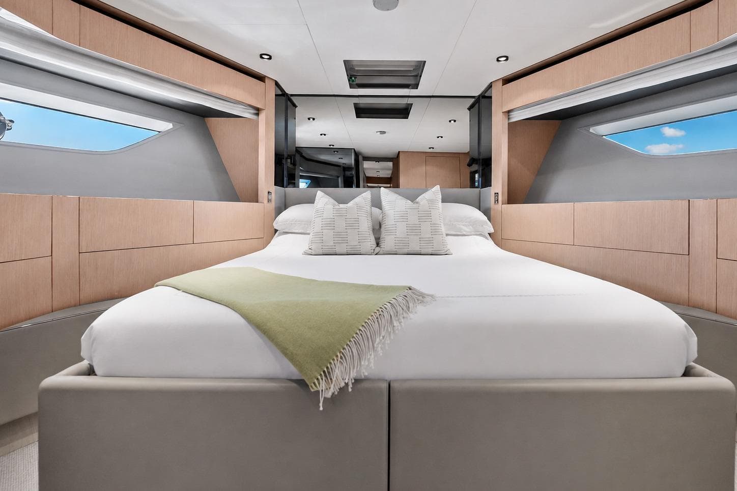 Luxurious bedroom interior of 2022 Ferretti Yachts 780 with modern design and elegant decor.