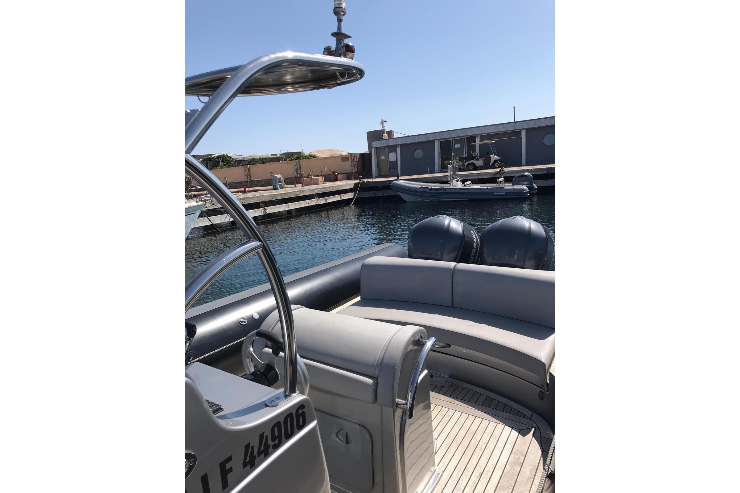 2016 Sea Water SMERALDA 300 boat docked at marina with dual engines.