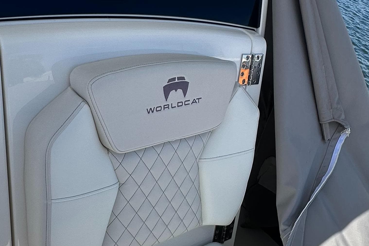 2024 World Cat 280ccx boat seat with logo, featuring diamond-patterned upholstery.
