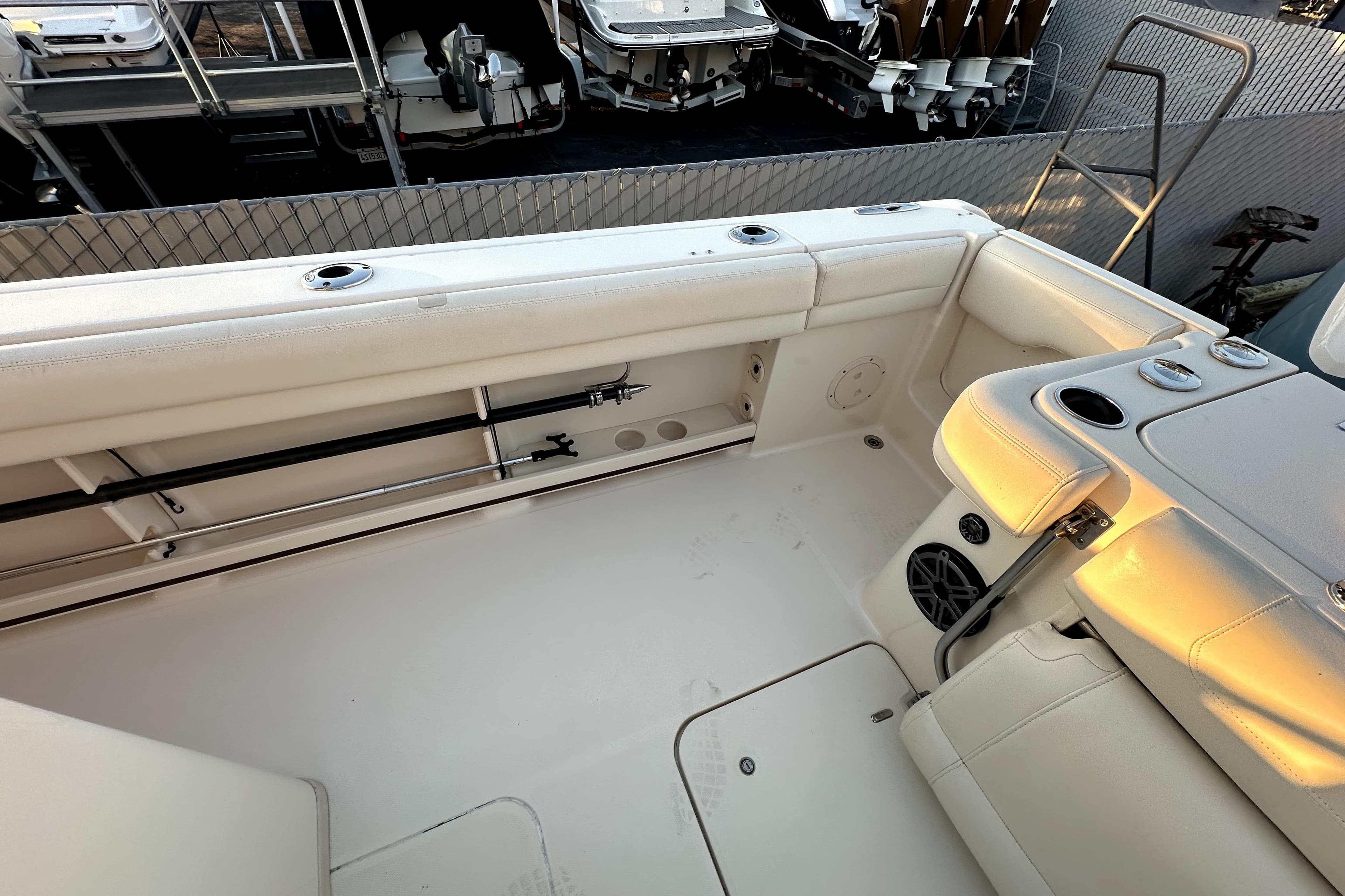 2019 Grady-White Canyon 336 boat interior with rod holders and seating.