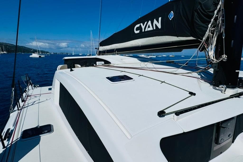 Outremer 59.2 sailboat on calm blue waters, 2021 model, featuring sleek design and rigging.