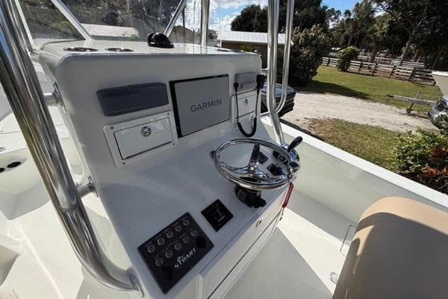 Control panel of a 2017 Stuart 27 boat with Garmin navigation system.