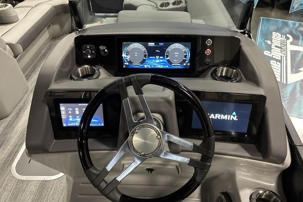 2025 Bennington LX Sport Quad Bench 24 LXSFBA dashboard with Garmin navigation and modern controls.