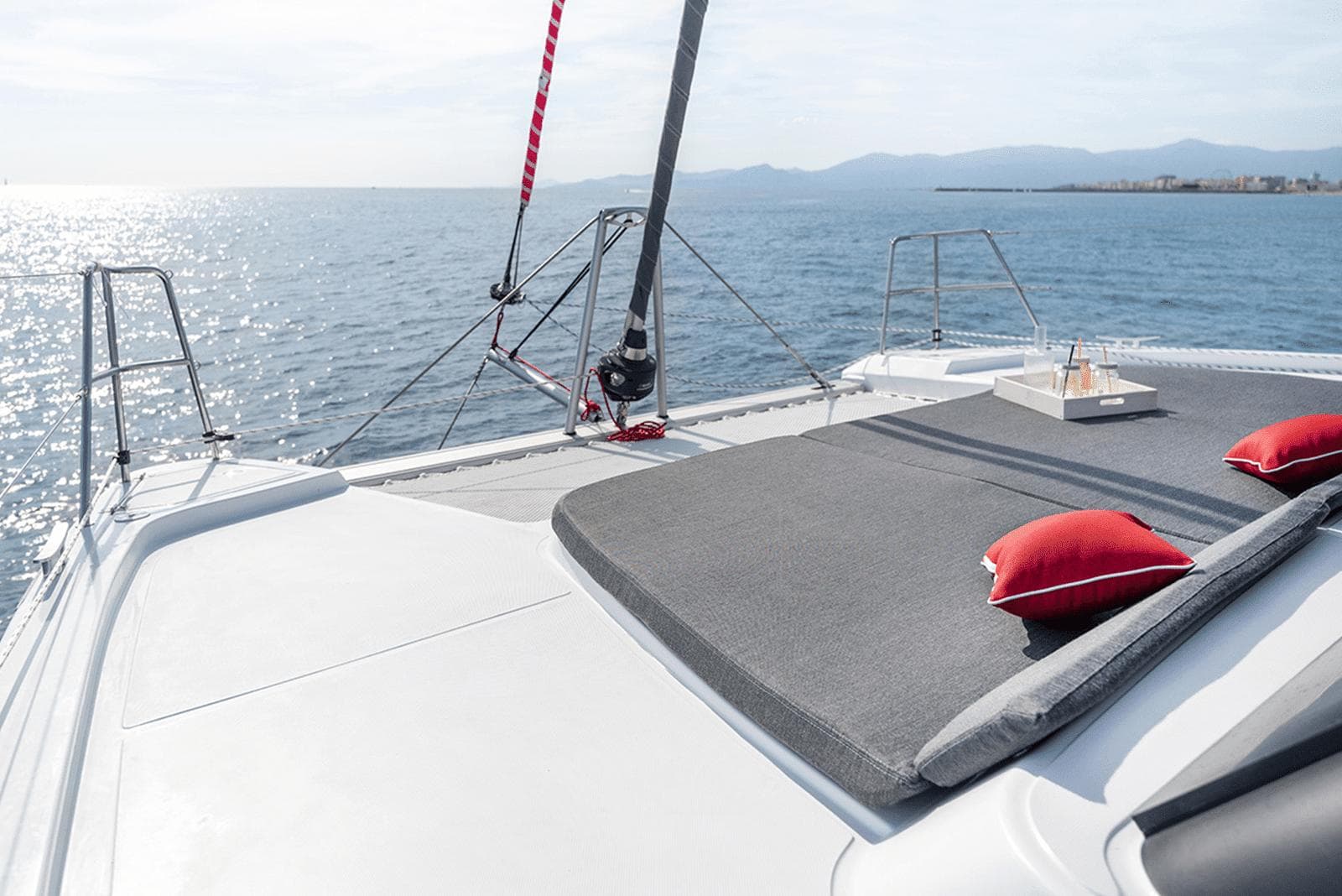Luxury Aventura 37 yacht deck with cushions, ocean view, 2026 model.