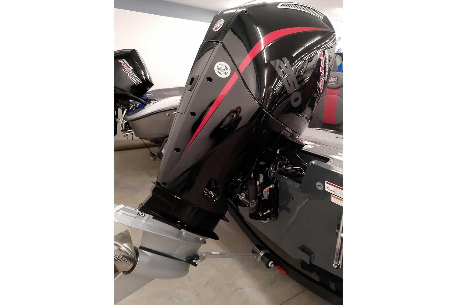 2026 Ranger VX1988 WT boat with powerful black and red outboard motor.