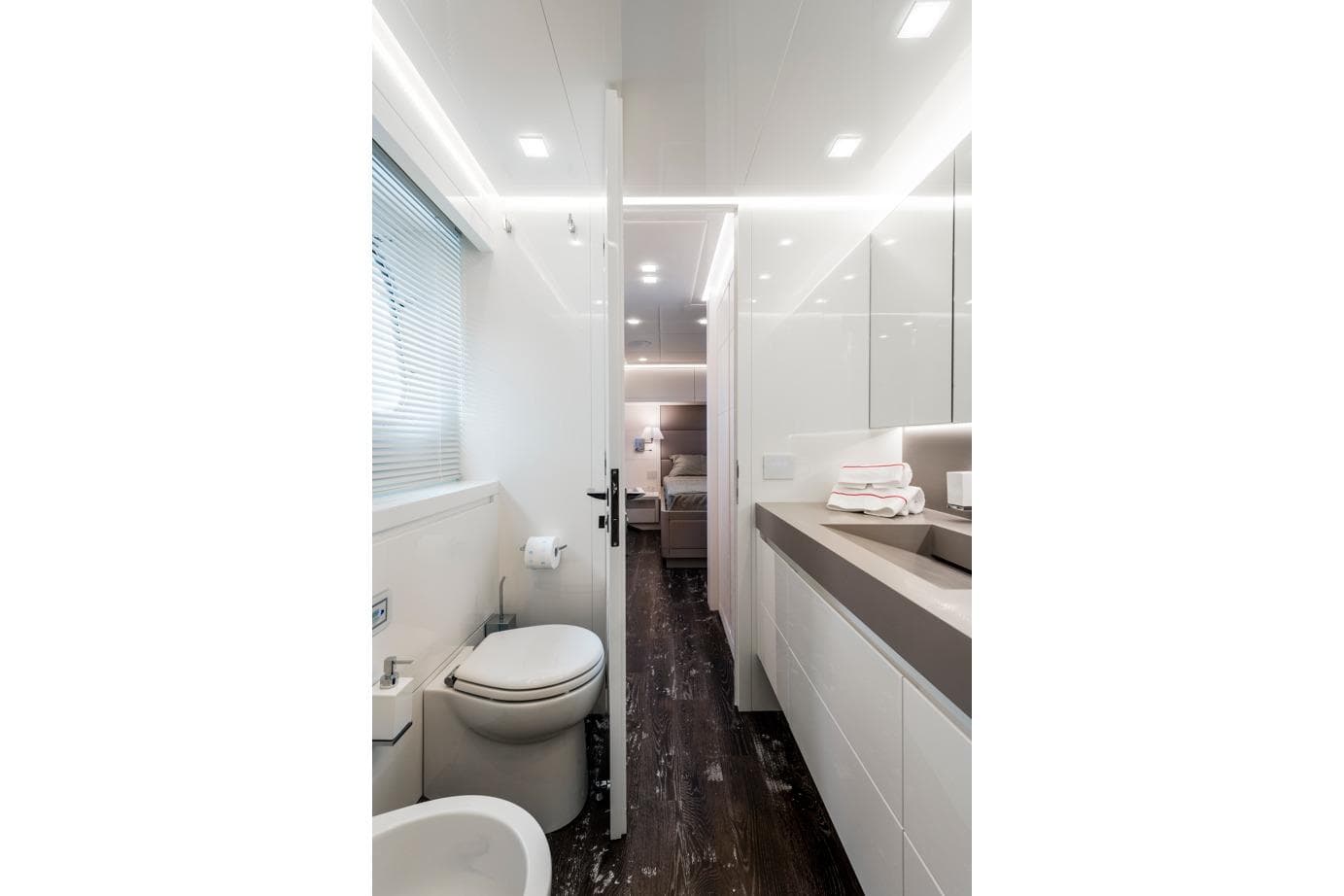 Luxurious bathroom interior of 2018 Maiora 36 yacht, featuring modern design and sleek finishes.