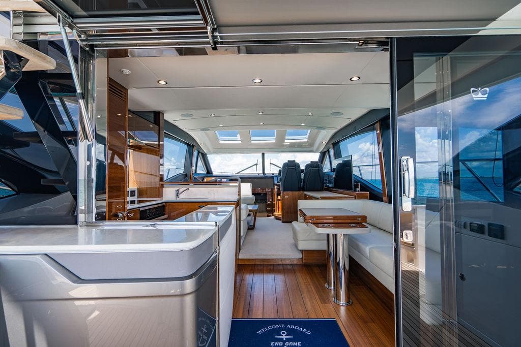 Luxurious interior of 2021 Princess S62 yacht with modern design and wooden flooring.