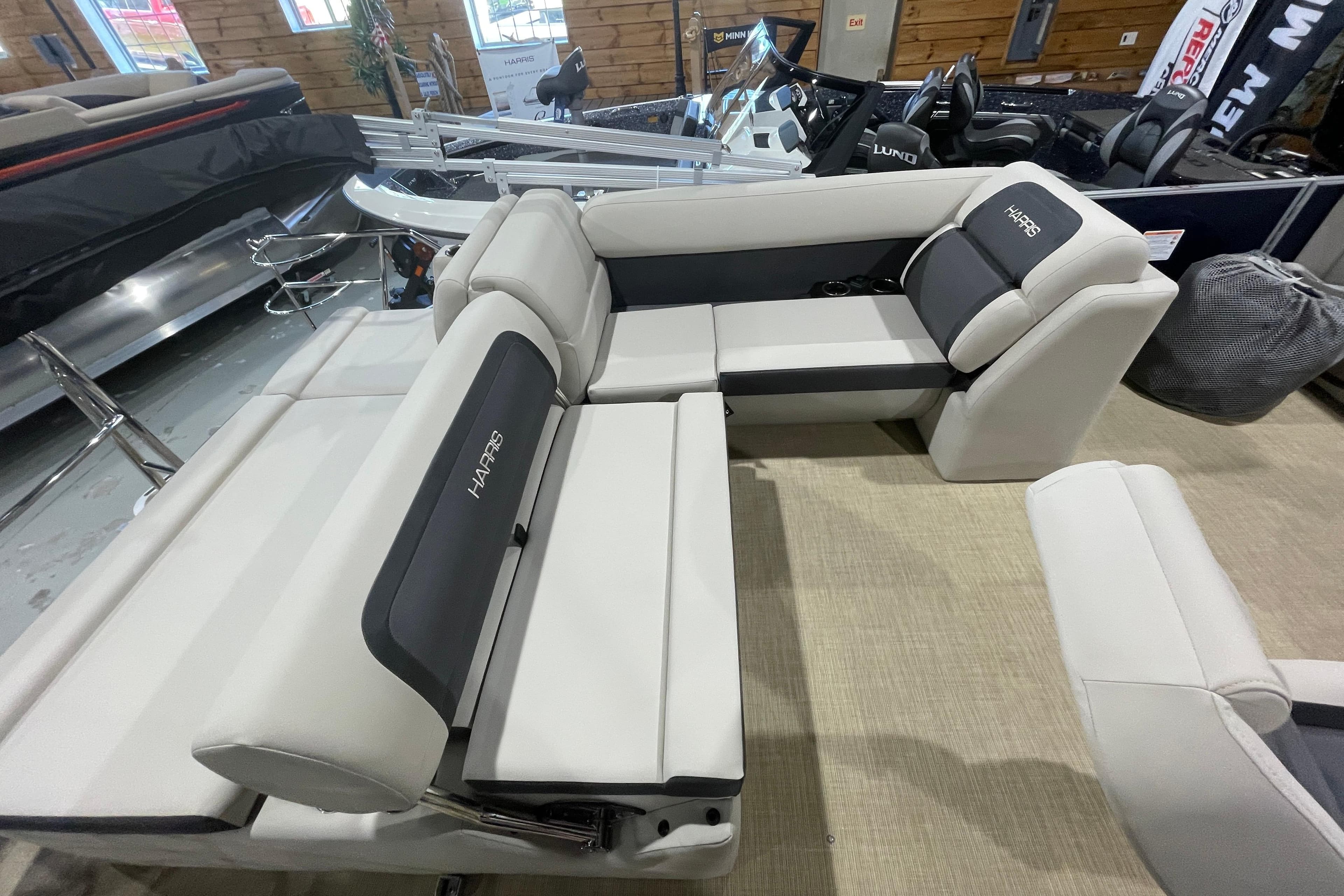 2026 Harris Cruiser 210 SL boat interior with plush seating and modern design.