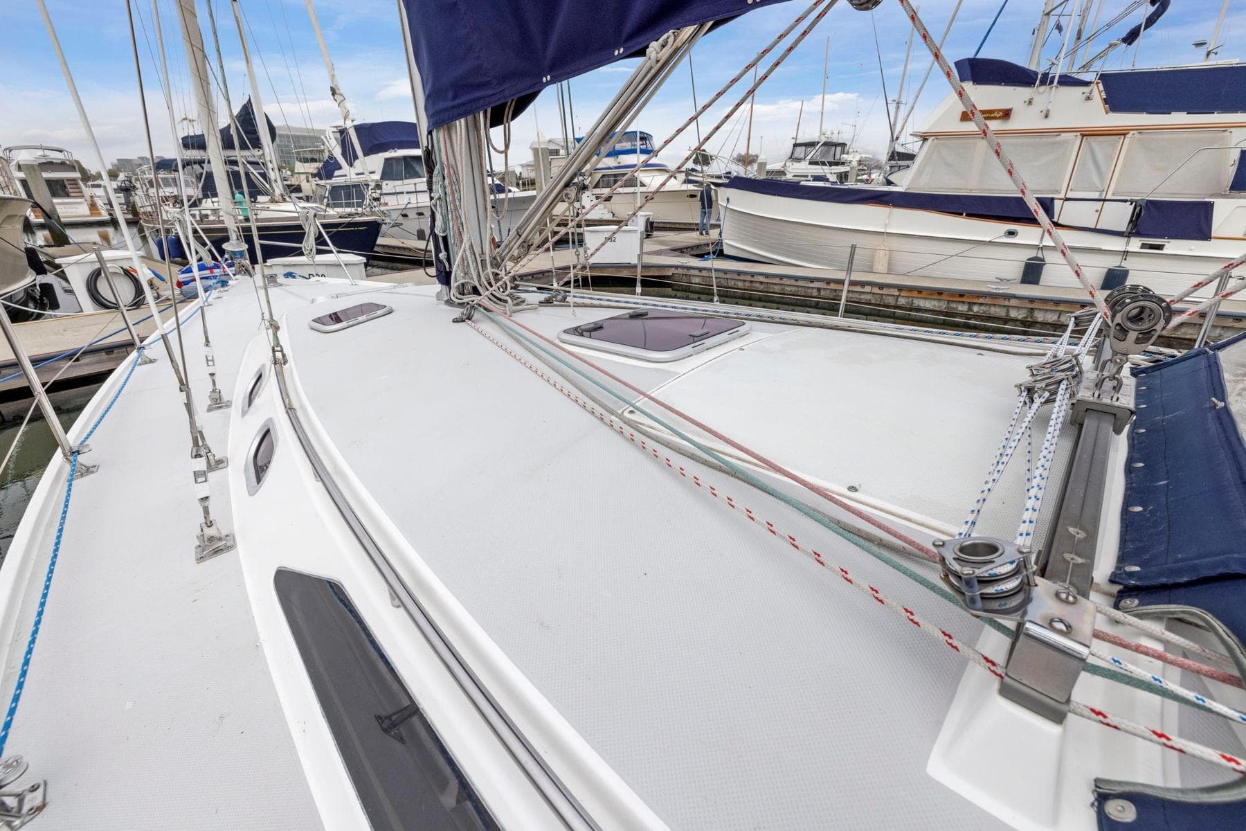 2004 Catalina 36 MkII sailboat deck with rigging at marina.