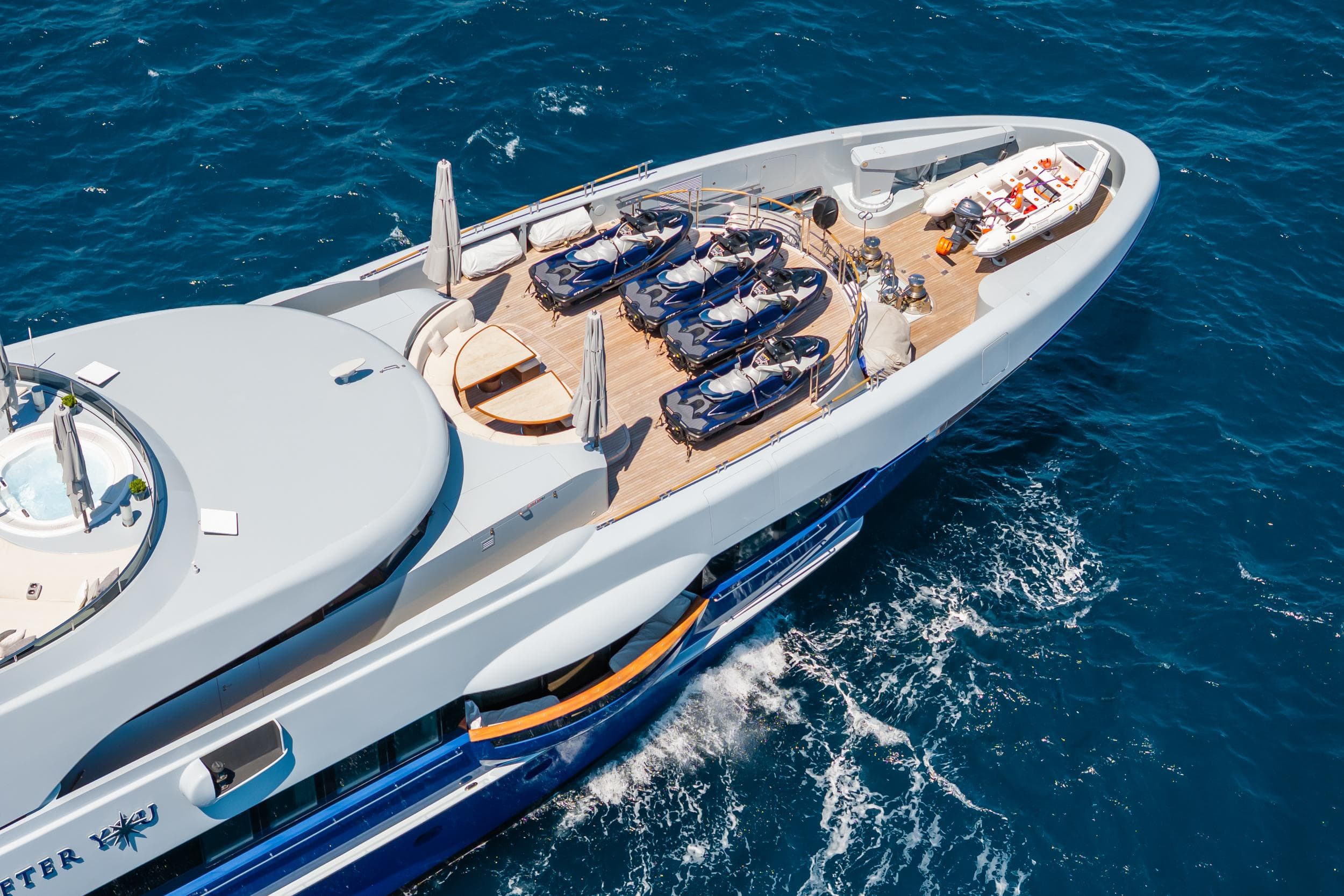 Aerial view of 2011 Heesen 55m yacht with jet skis on deck.