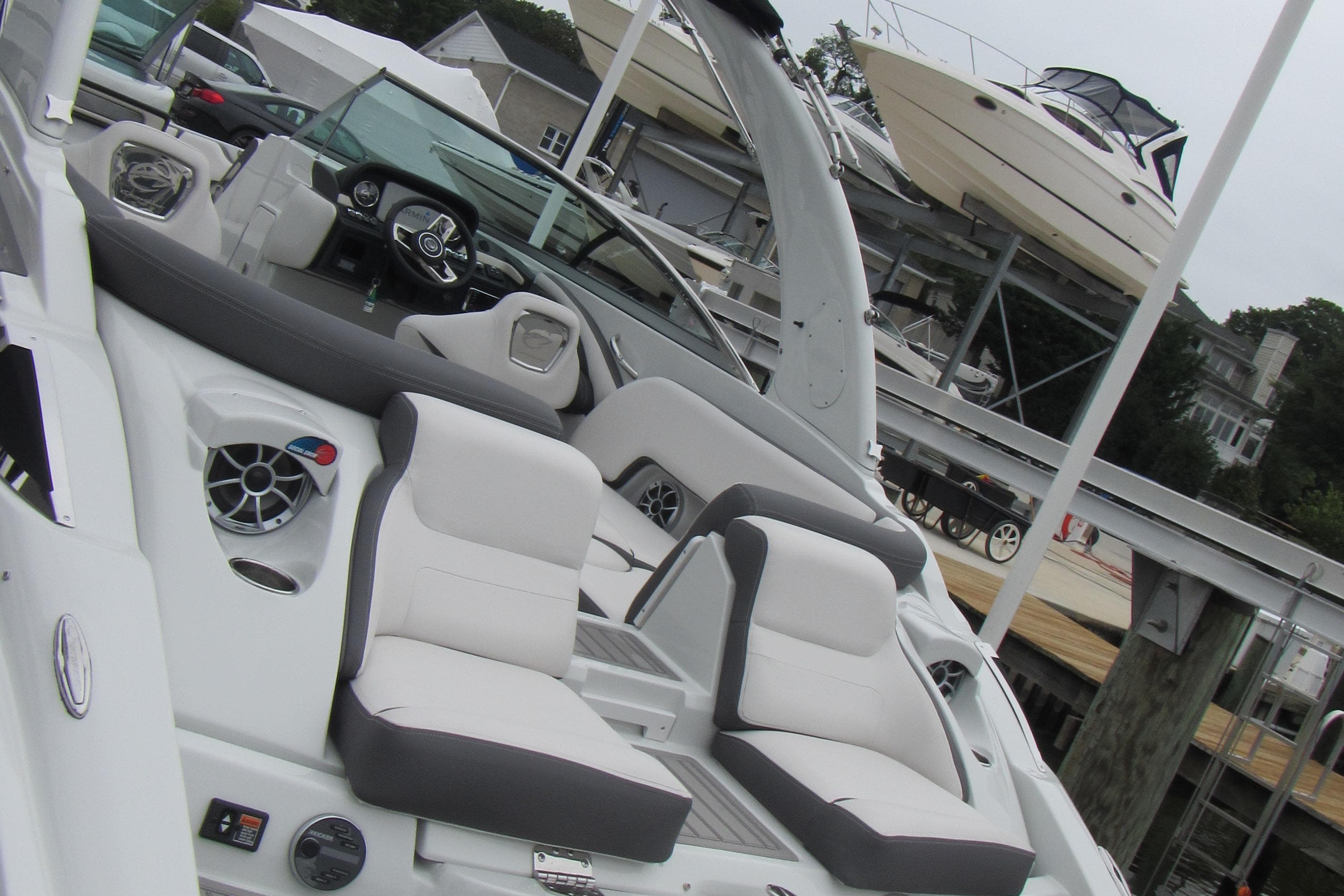 2023 Crownline 270 SS boat interior with plush seating and modern dashboard.