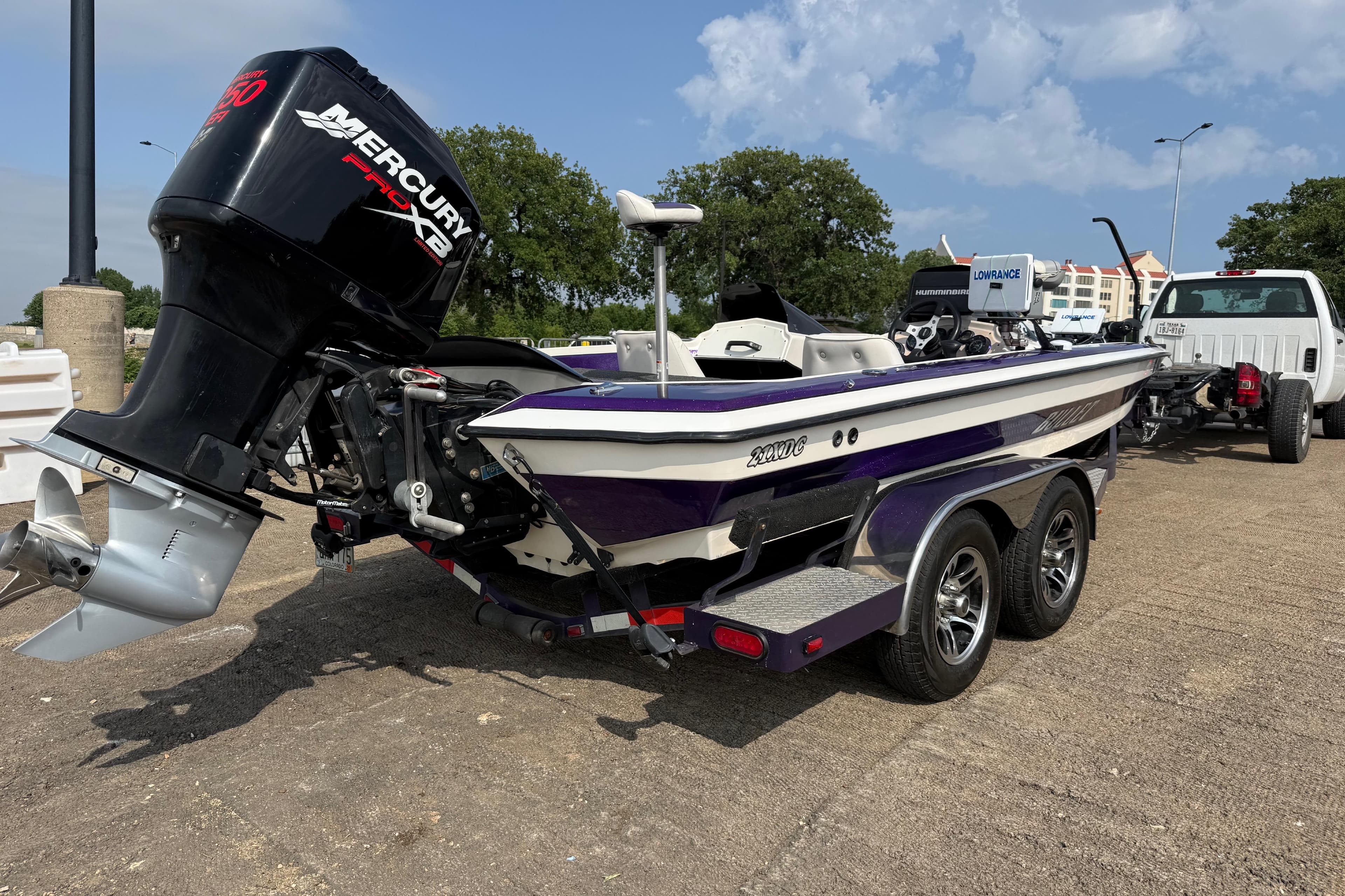 2002 Bullet 21XDC boat with Mercury Pro XS engine on trailer.