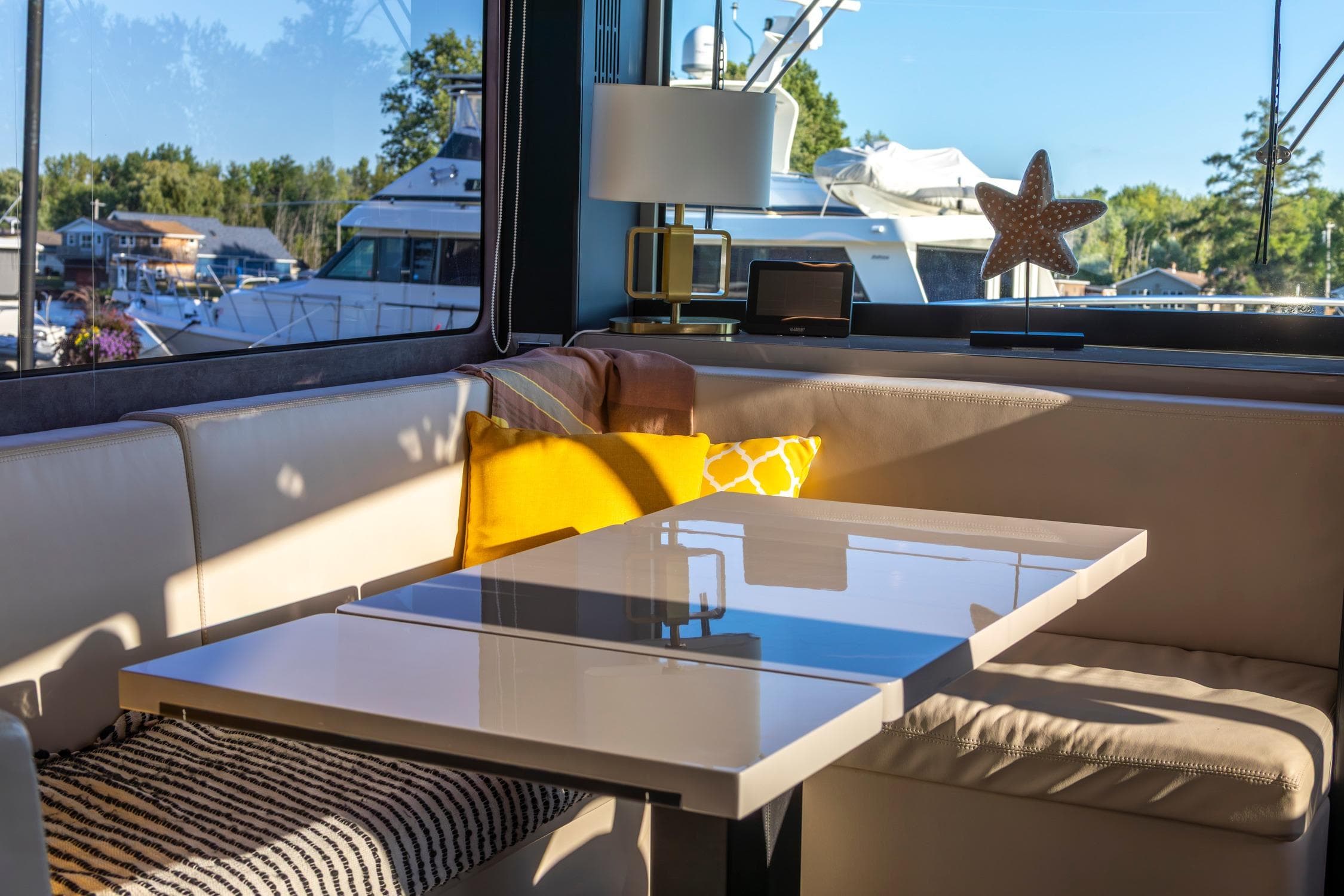 Luxurious interior of 2018 Cranchi Eco Trawler 53 Long Distance yacht with elegant seating.
