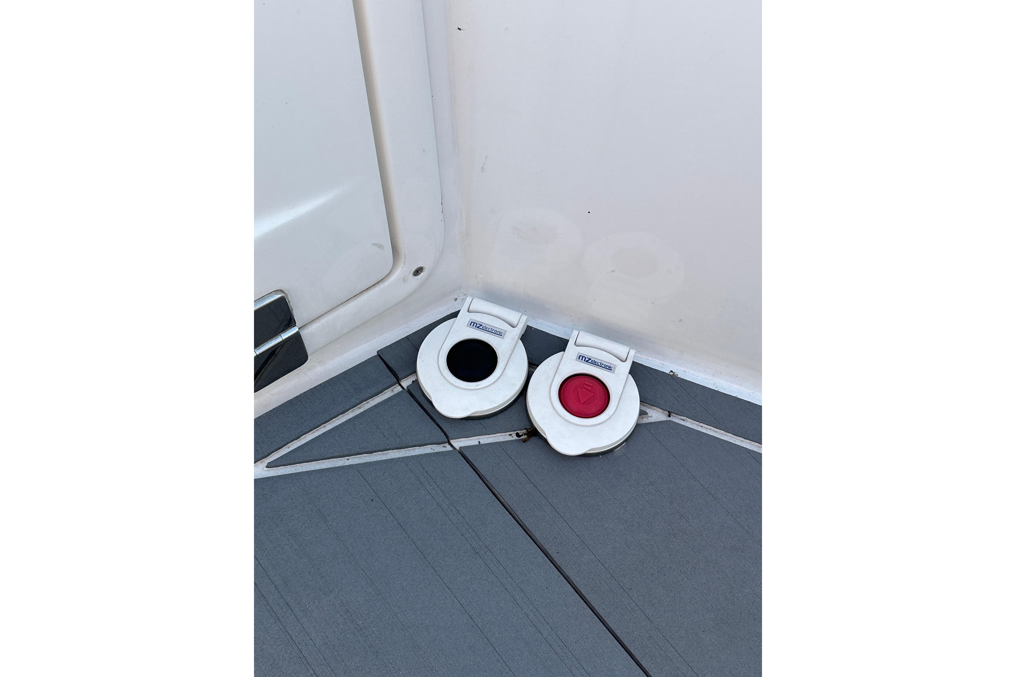 Schaefer V33 2022 boat deck with two white marine fuel caps.