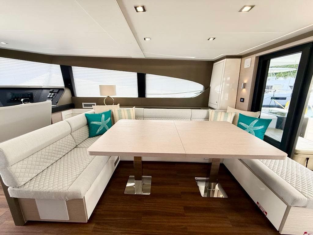 Luxurious interior of 2025 Aventura 56 Motor Yacht with elegant seating and modern decor.