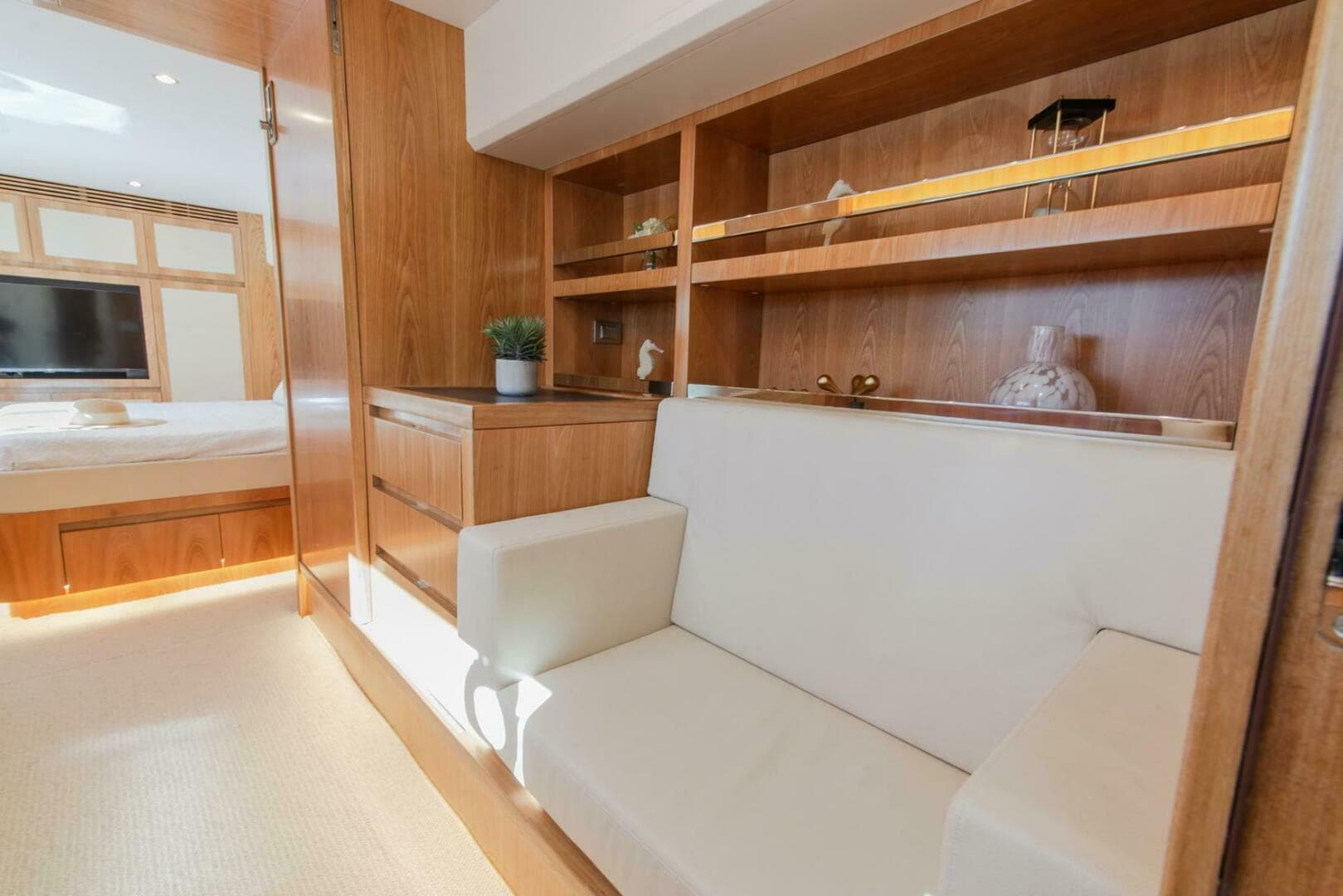 Luxurious interior of ILIAD 53E yacht, featuring elegant wood finishes and modern furnishings, 2026 model.