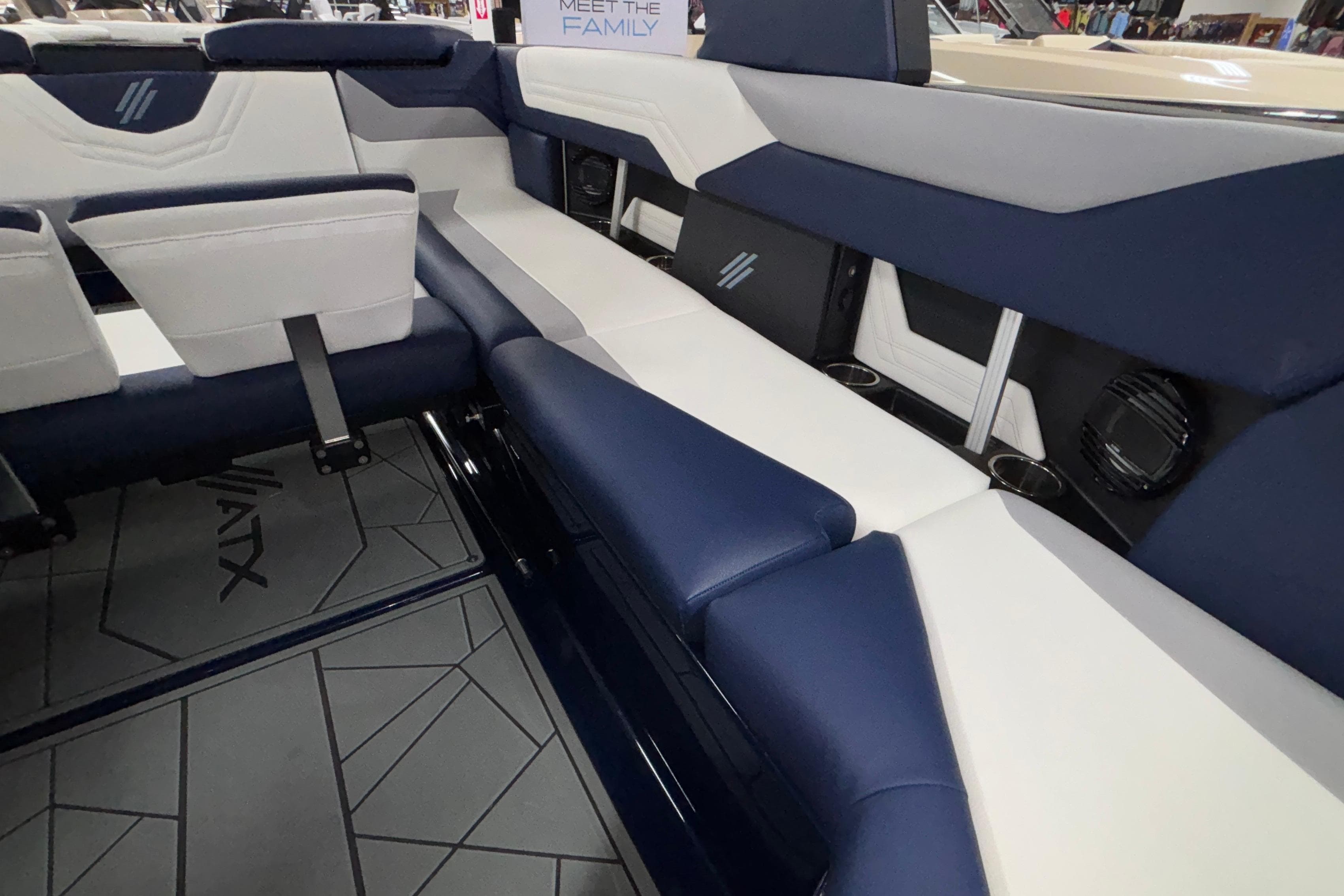 2026 ATX Surf Boats 24 Type-S interior with blue and white seating, modern design.