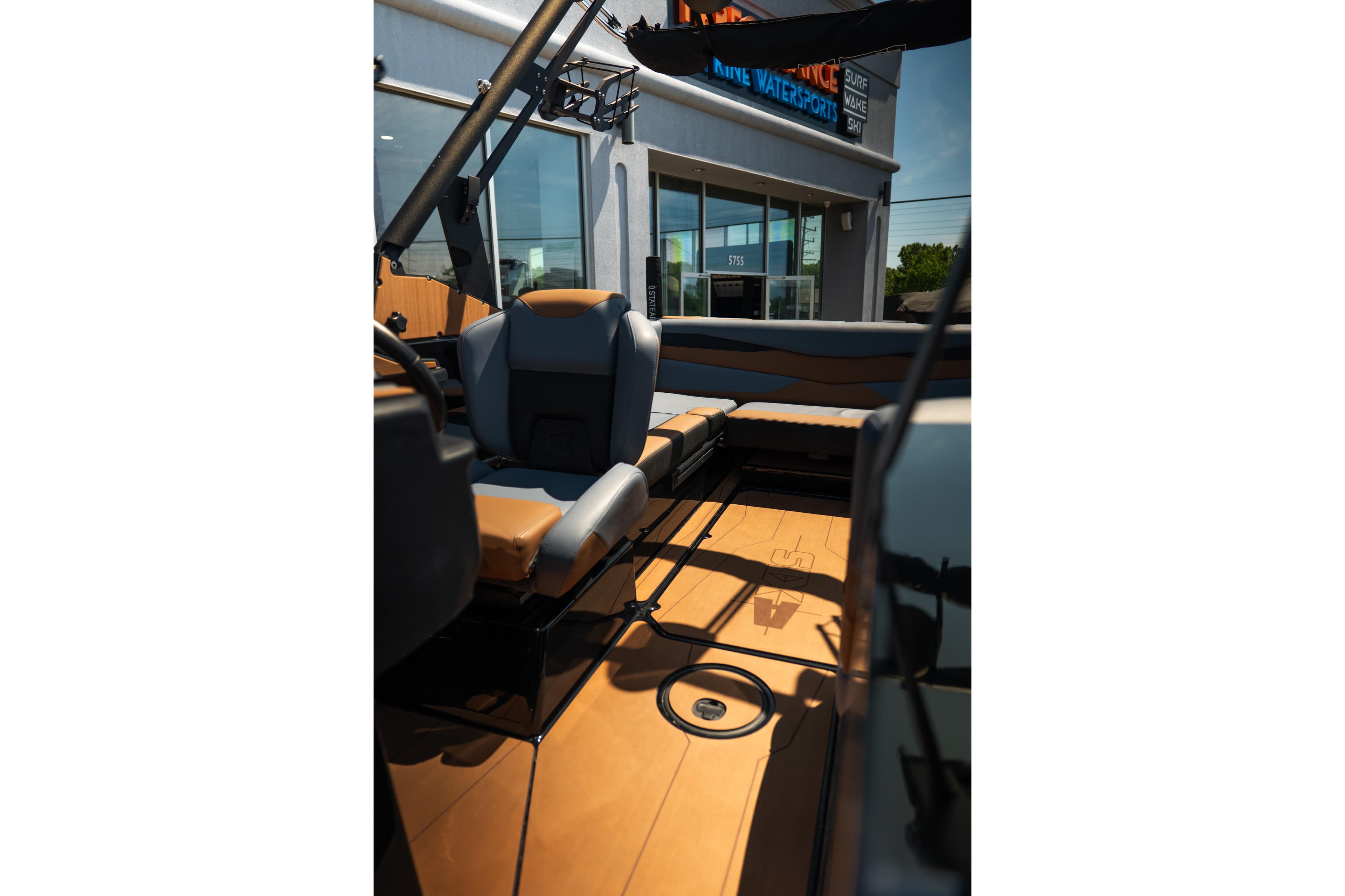Interior of 2025 Axis A225 boat with modern seating and sleek design.