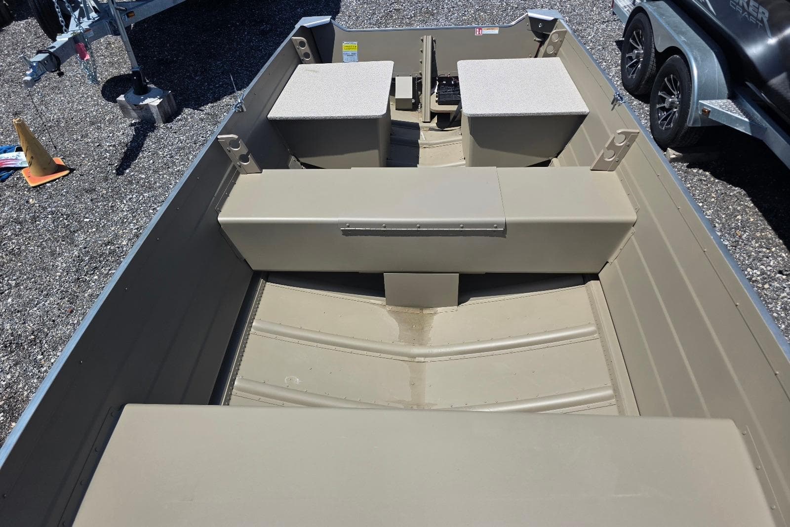 2026 Smoker Craft Voyager 16 boat interior with seating and storage compartments.