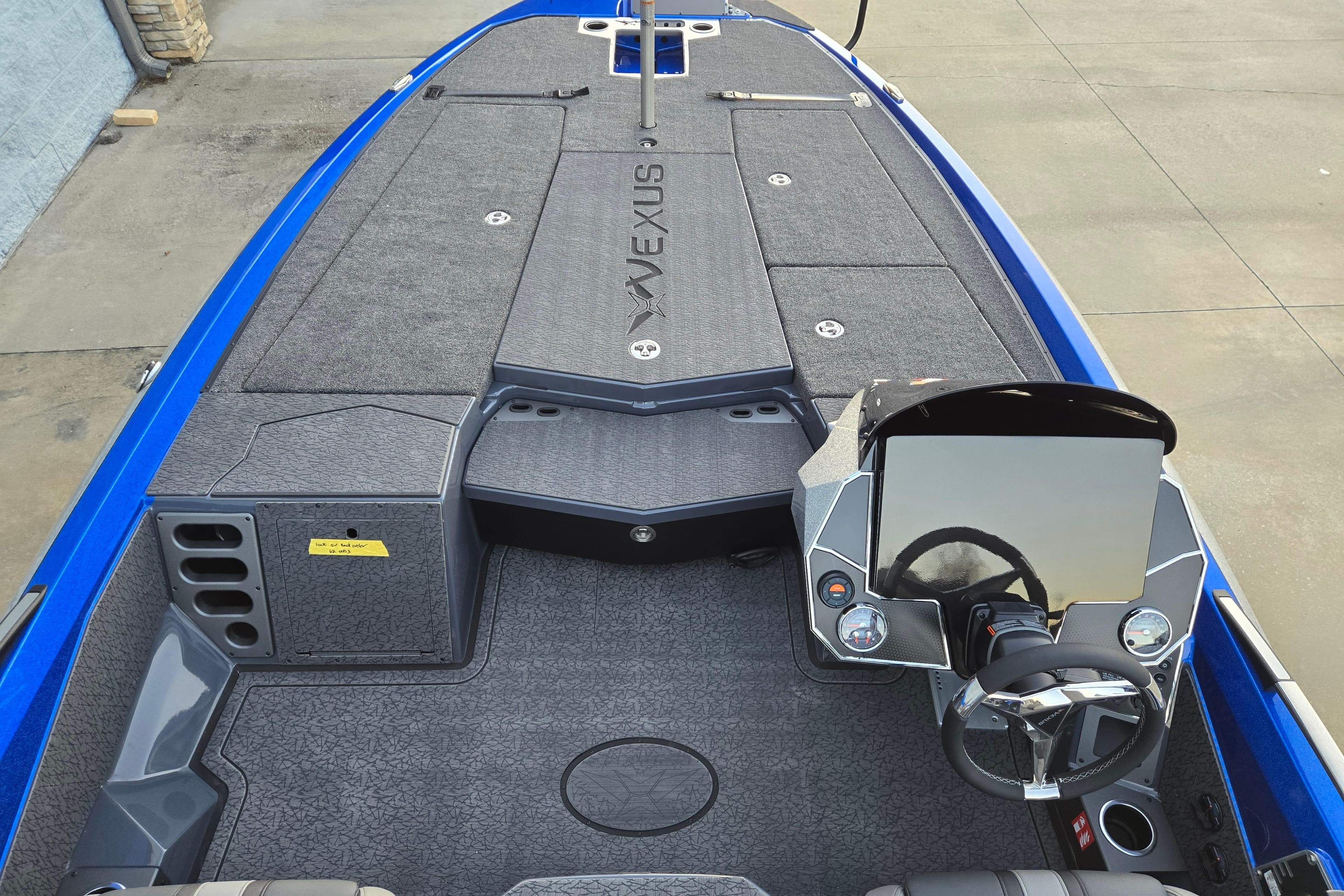 2026 Vexus VXs20 boat interior with steering console and spacious deck layout.