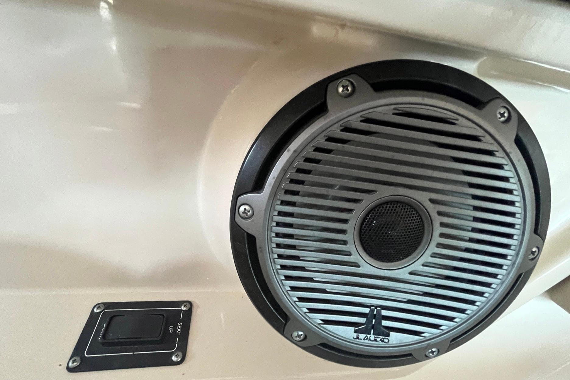 Speaker and control panel on 2022 Boston Whaler 320 Vantage boat interior.