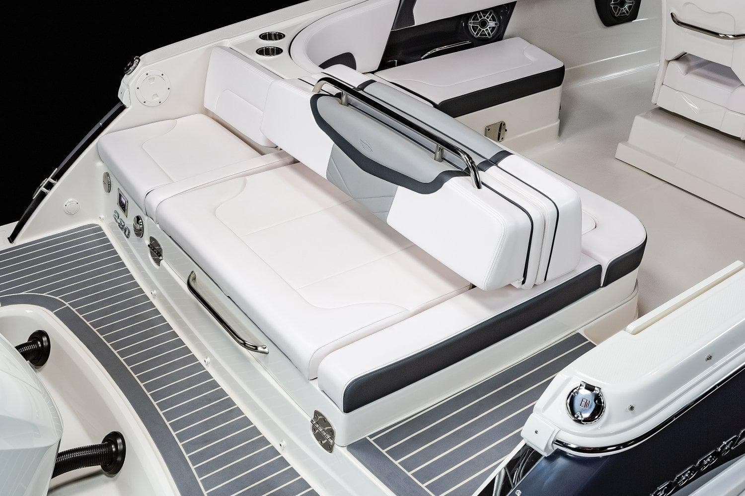 2025 Chaparral 280 OSX boat interior with white seating and sleek design.