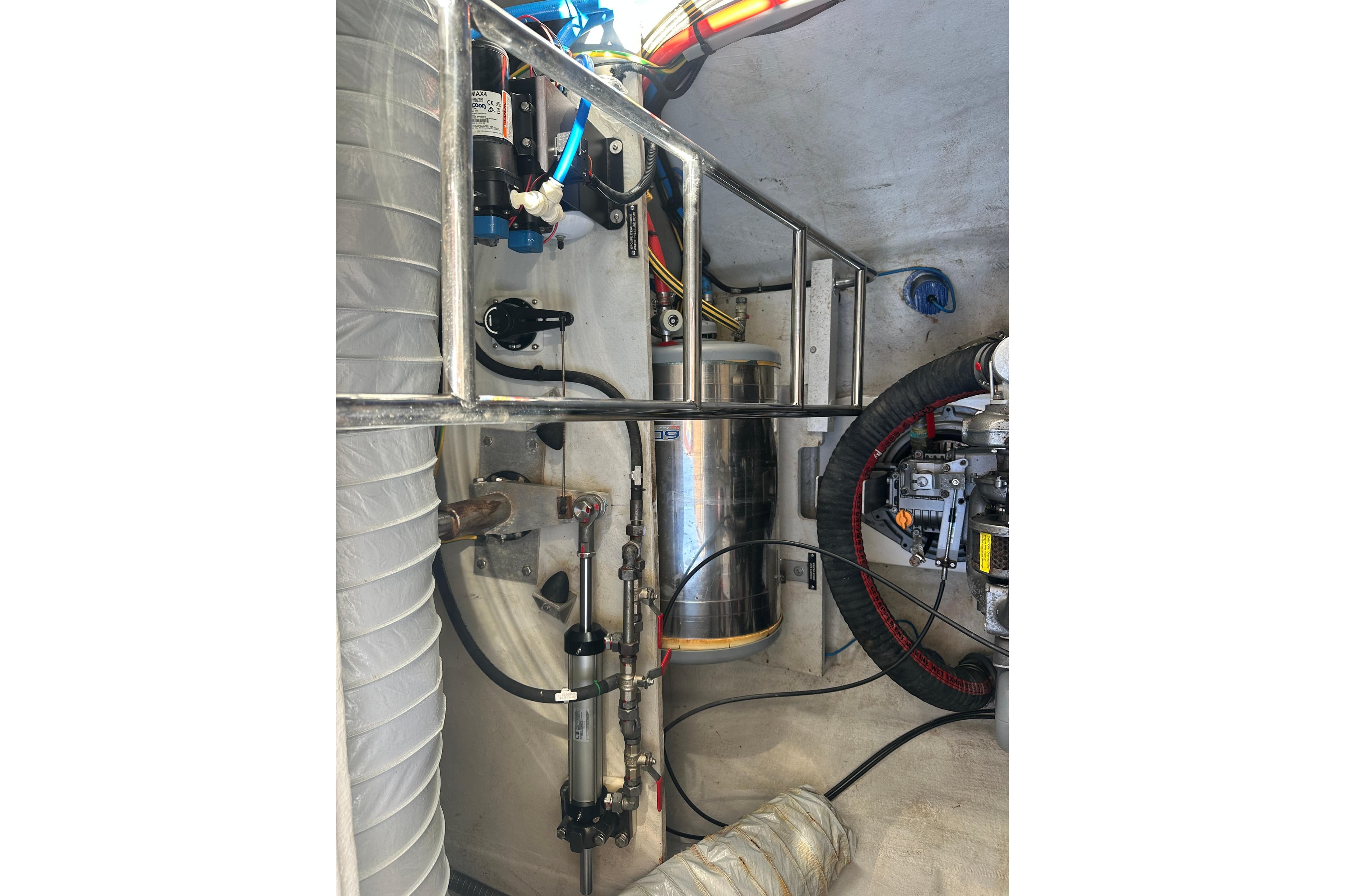 Engine compartment of a 2017 Lagoon 52 F yacht, showcasing mechanical components and wiring.