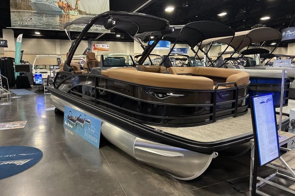 2026 Bennington 23 MSL pontoon boat displayed at a boat show.