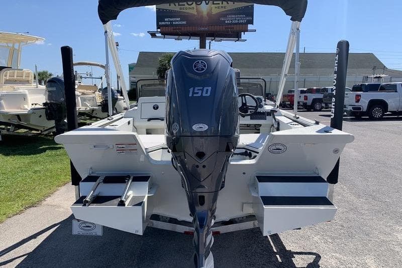 2026 SeaArk Easy 200 boat with Yamaha 150 outboard motor, displayed outdoors.