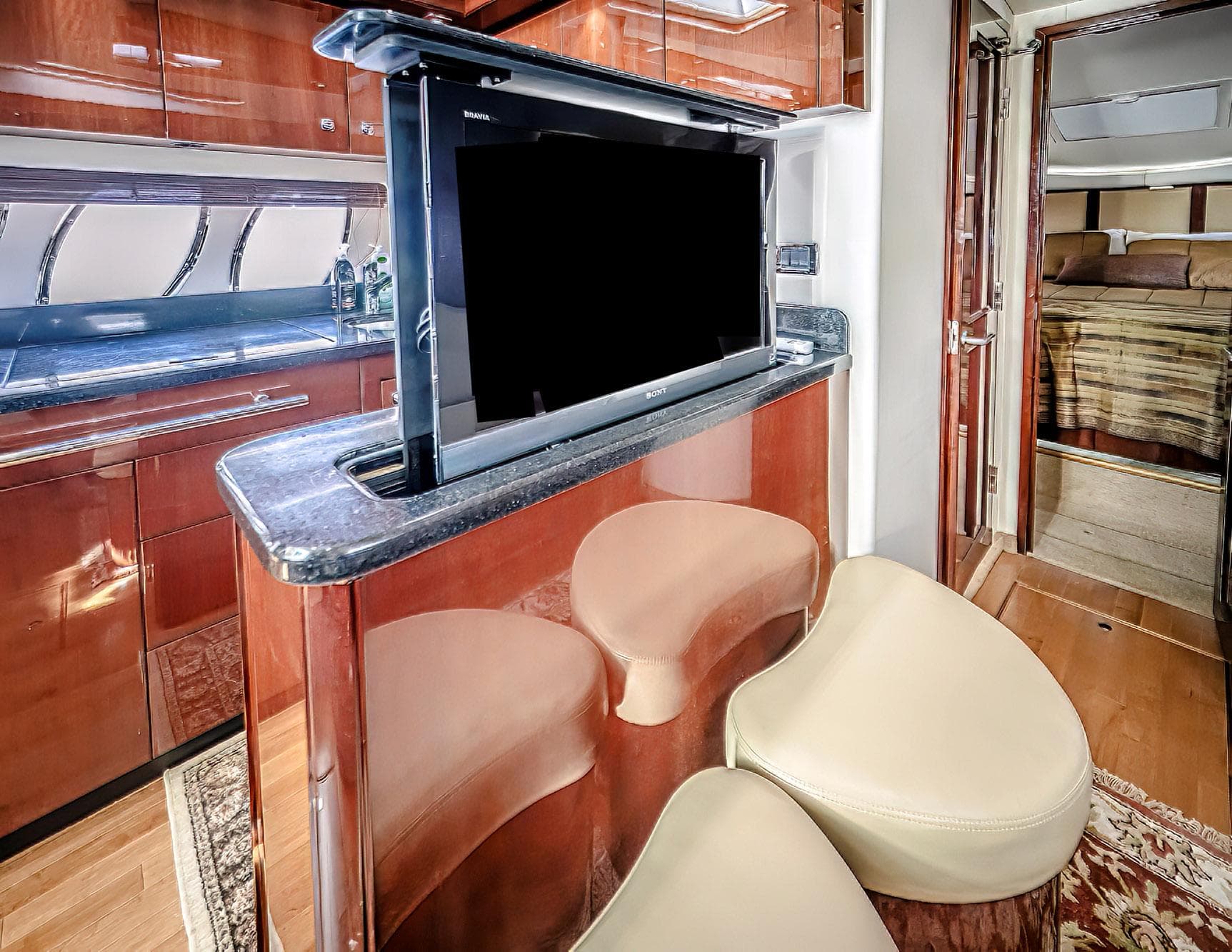 Luxurious interior of 2011 Sea Ray 580 Sundancer yacht with modern amenities.