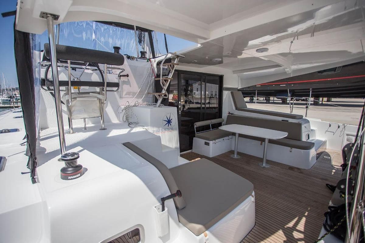 2019 Lagoon 42 catamaran with spacious outdoor seating and modern design.