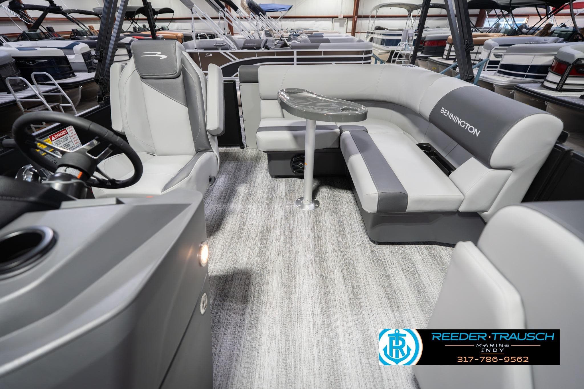 Interior of 2026 Bennington 188 SLJ pontoon boat with modern seating and steering console.