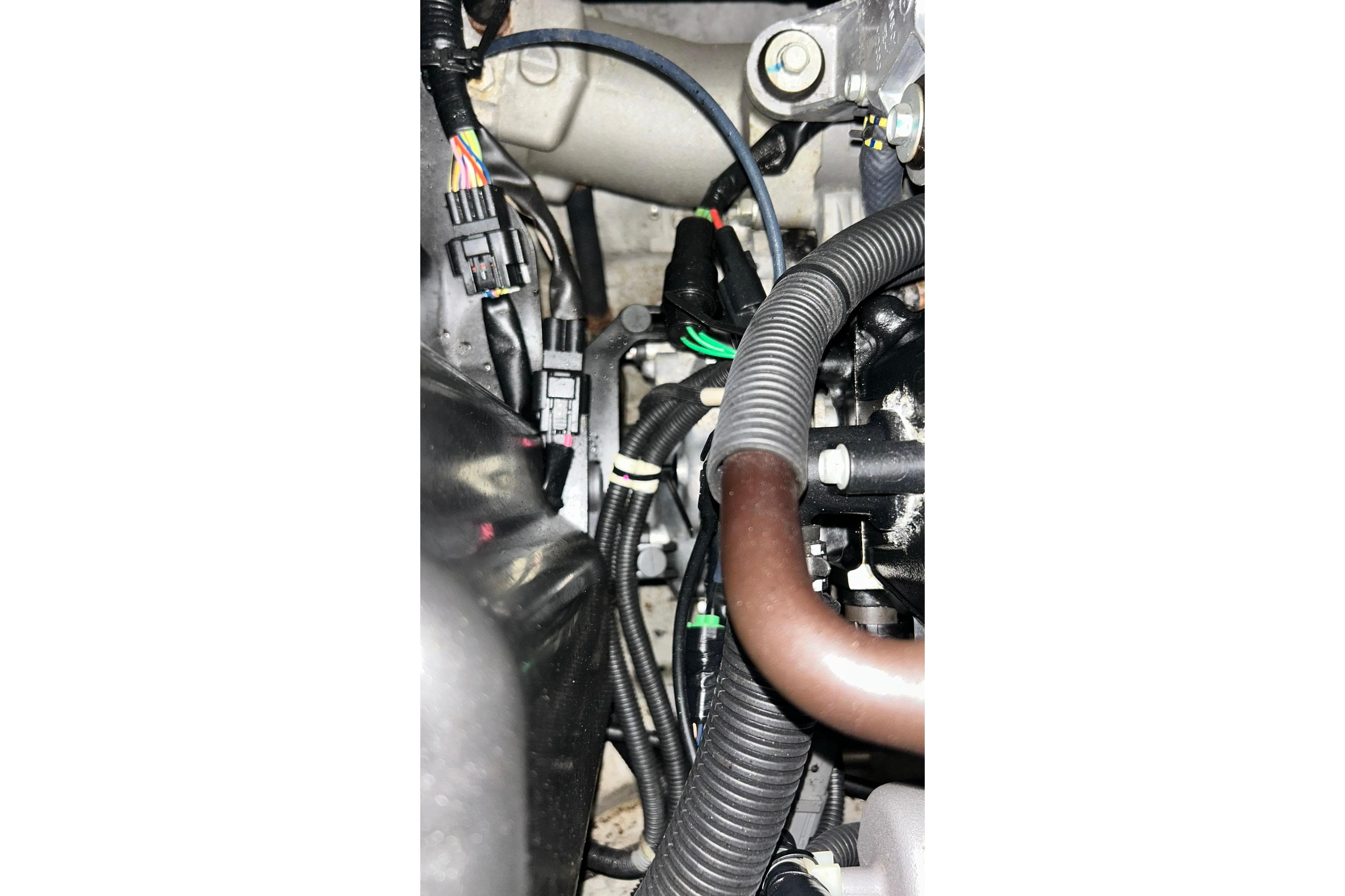 Close-up of 2017 Yamaha WaveRunner FX Cruiser SVHO engine components and wiring.