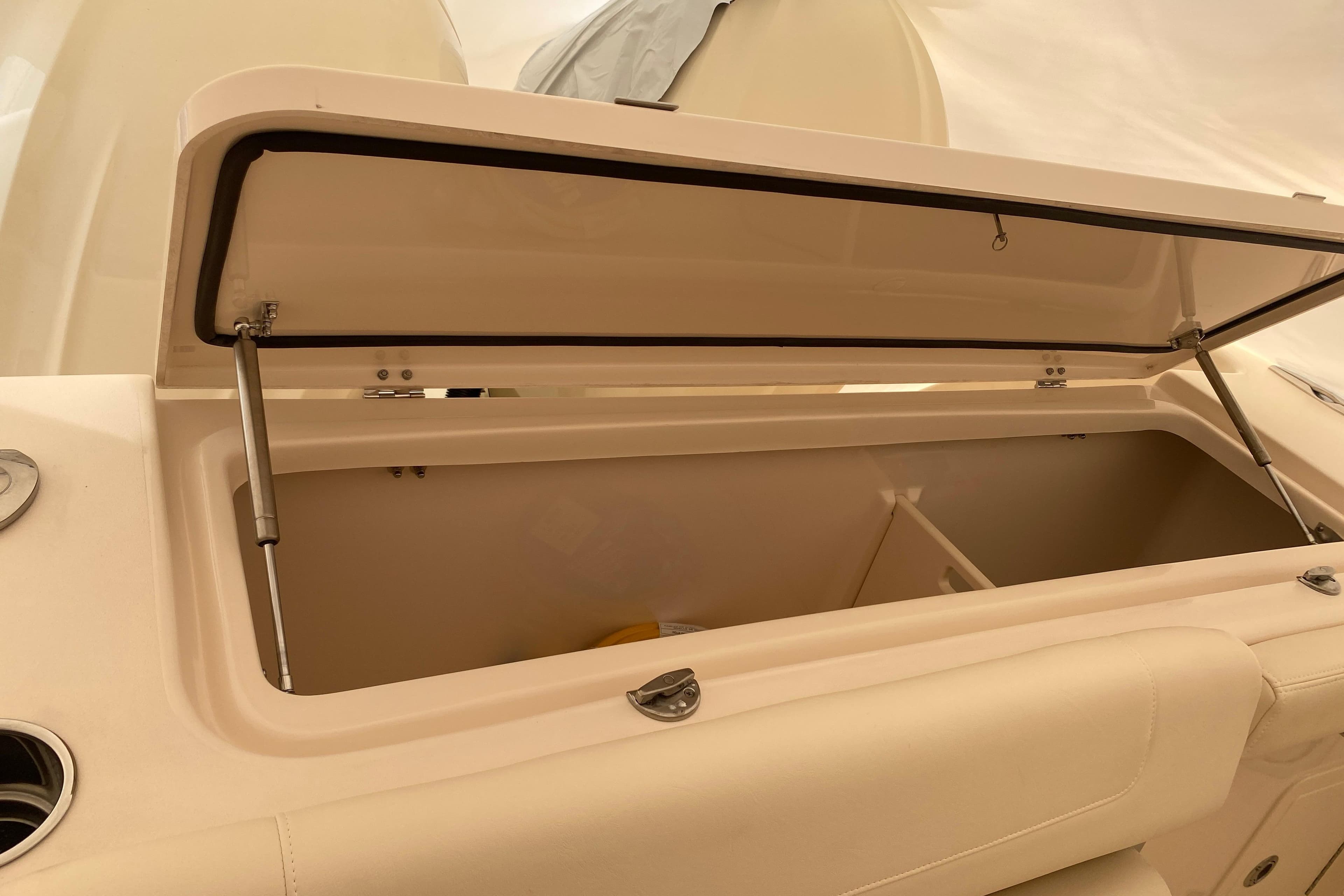 Open storage compartment on 2026 Grady-White Canyon 306 boat.