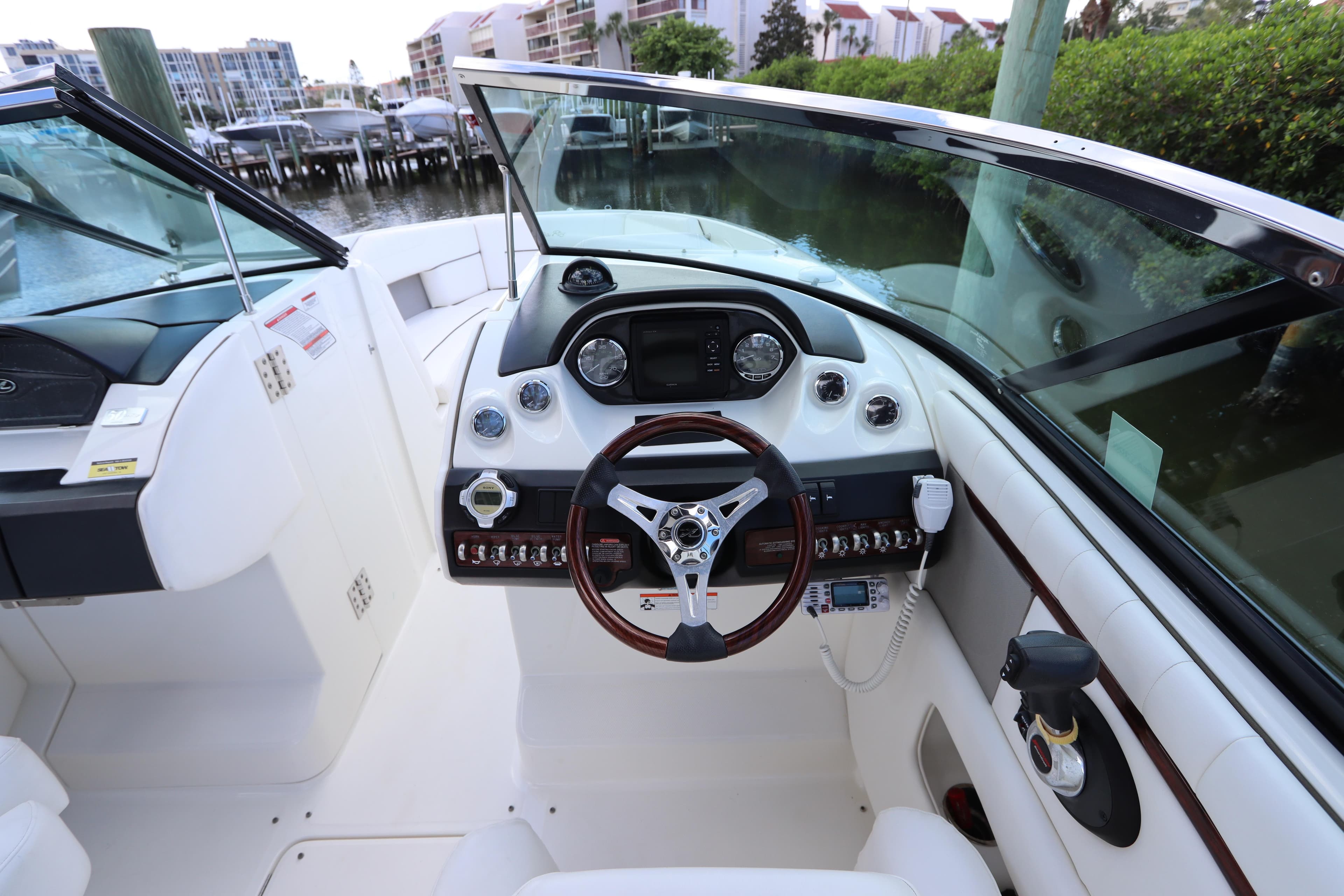 Interior view of a 2009 Sea Ray 270 Select EX boat cockpit.