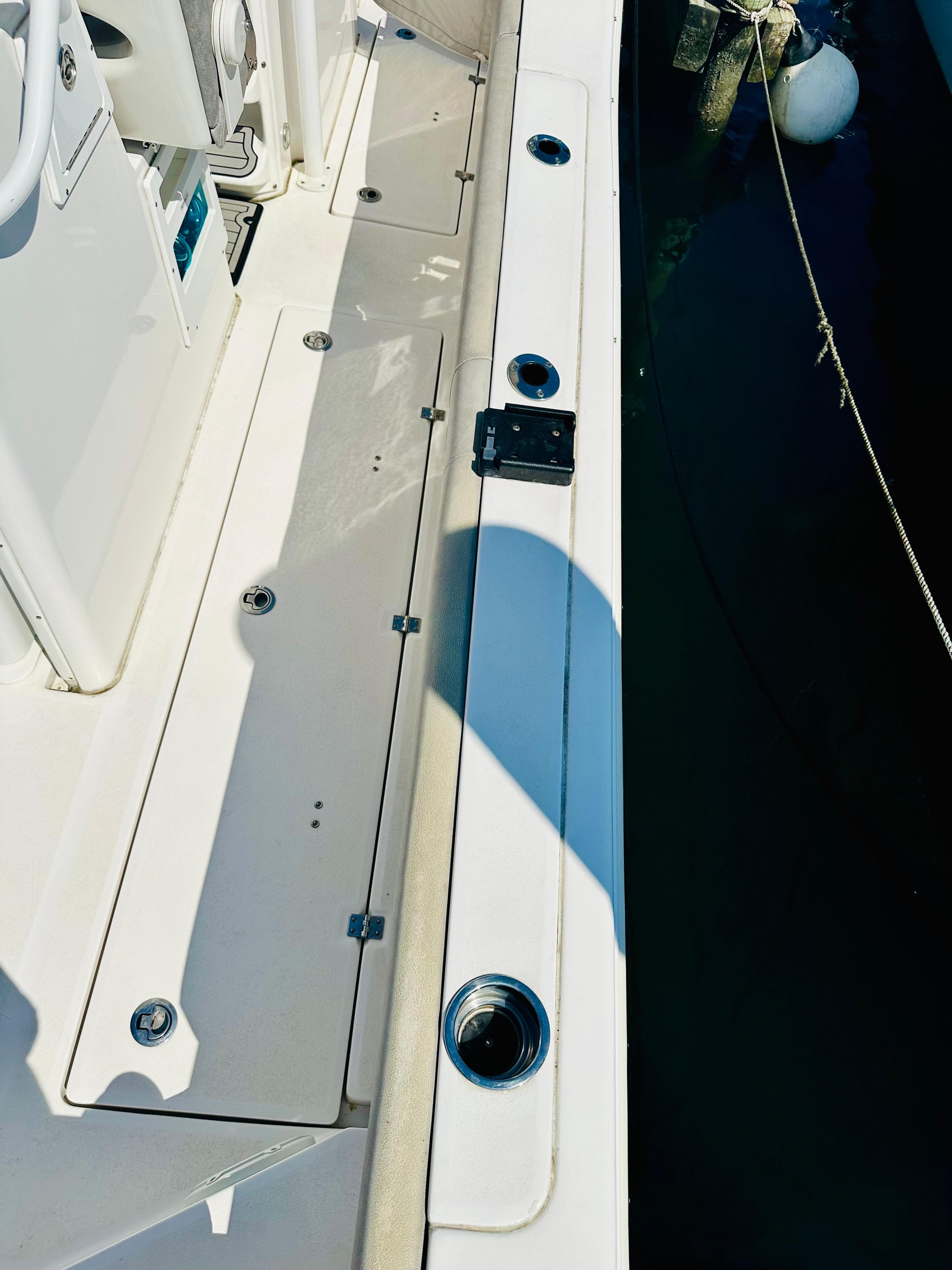 2019 Sea Fox 328 Commander boat deck with rod holders and clean design.