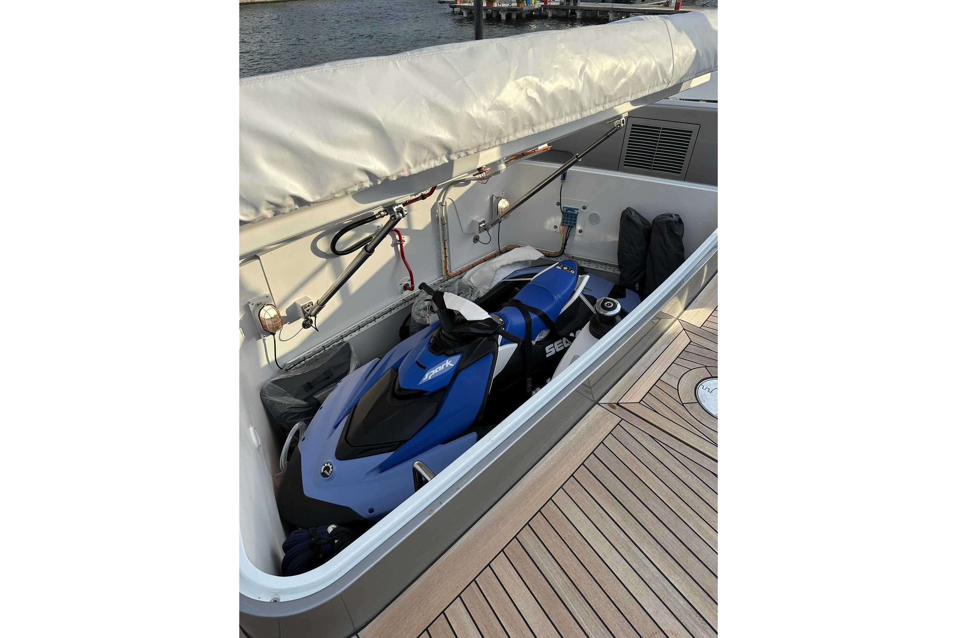 Jet ski stored on 2024 Benetti Oasis 34M yacht deck, ready for adventure.